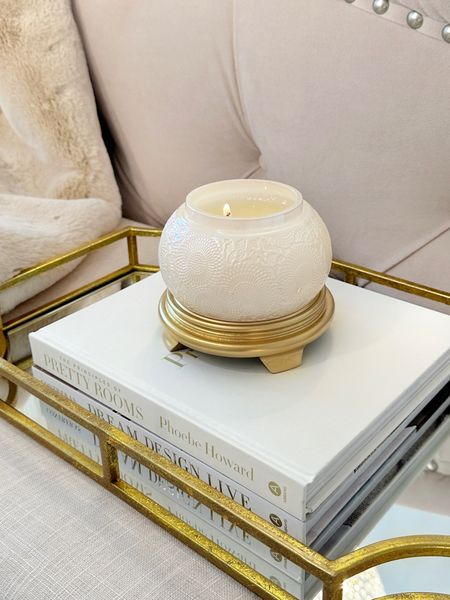 Ginger jar riser painted gold and used as a candle tray 

Home decor gold tray coffee table books 

#LTKHoliday #LTKstyletip #LTKhome