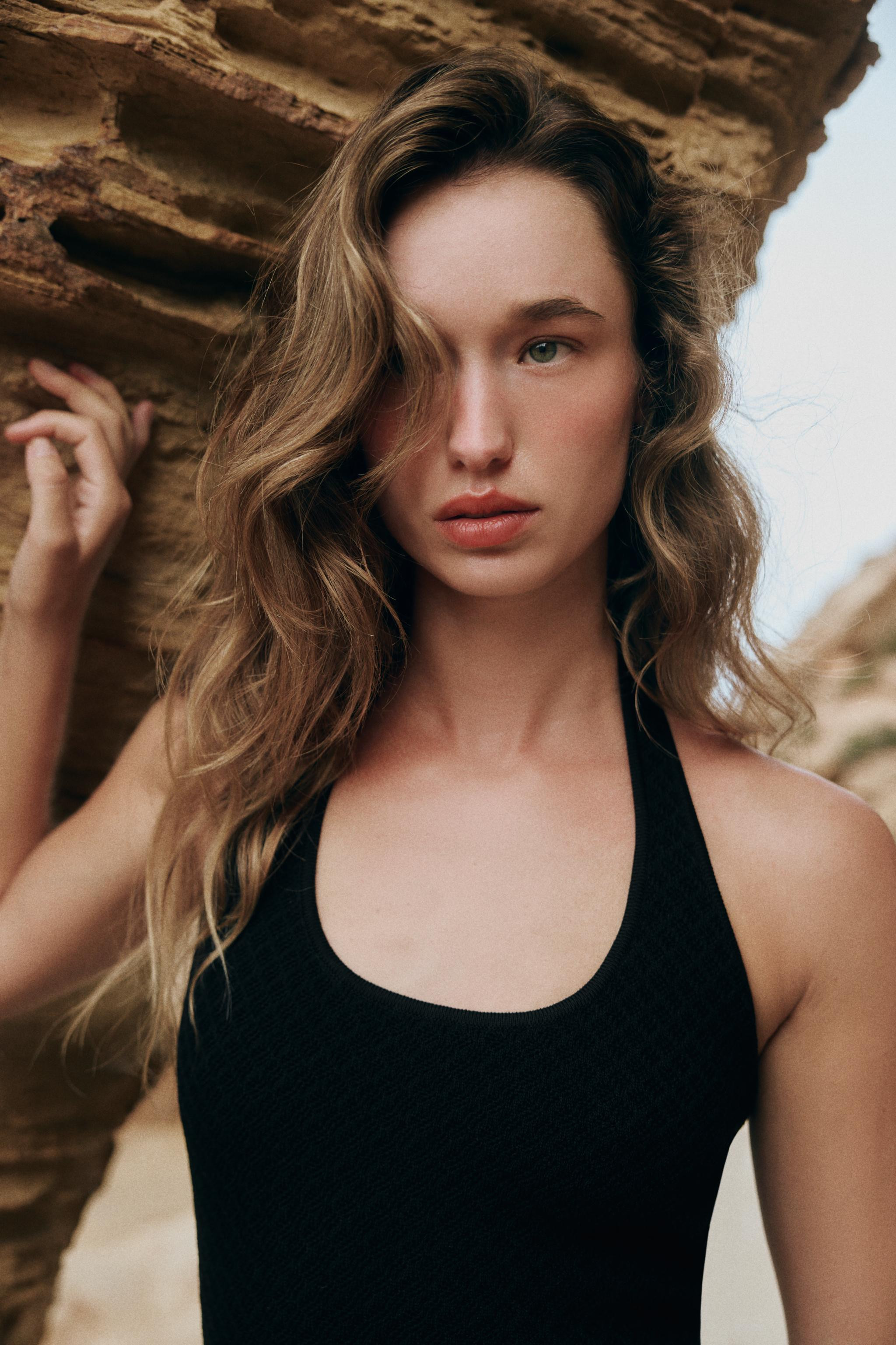Long halter neck dress with a round neckline and open back. Combined fabric with a flowing hem. | Zara UK