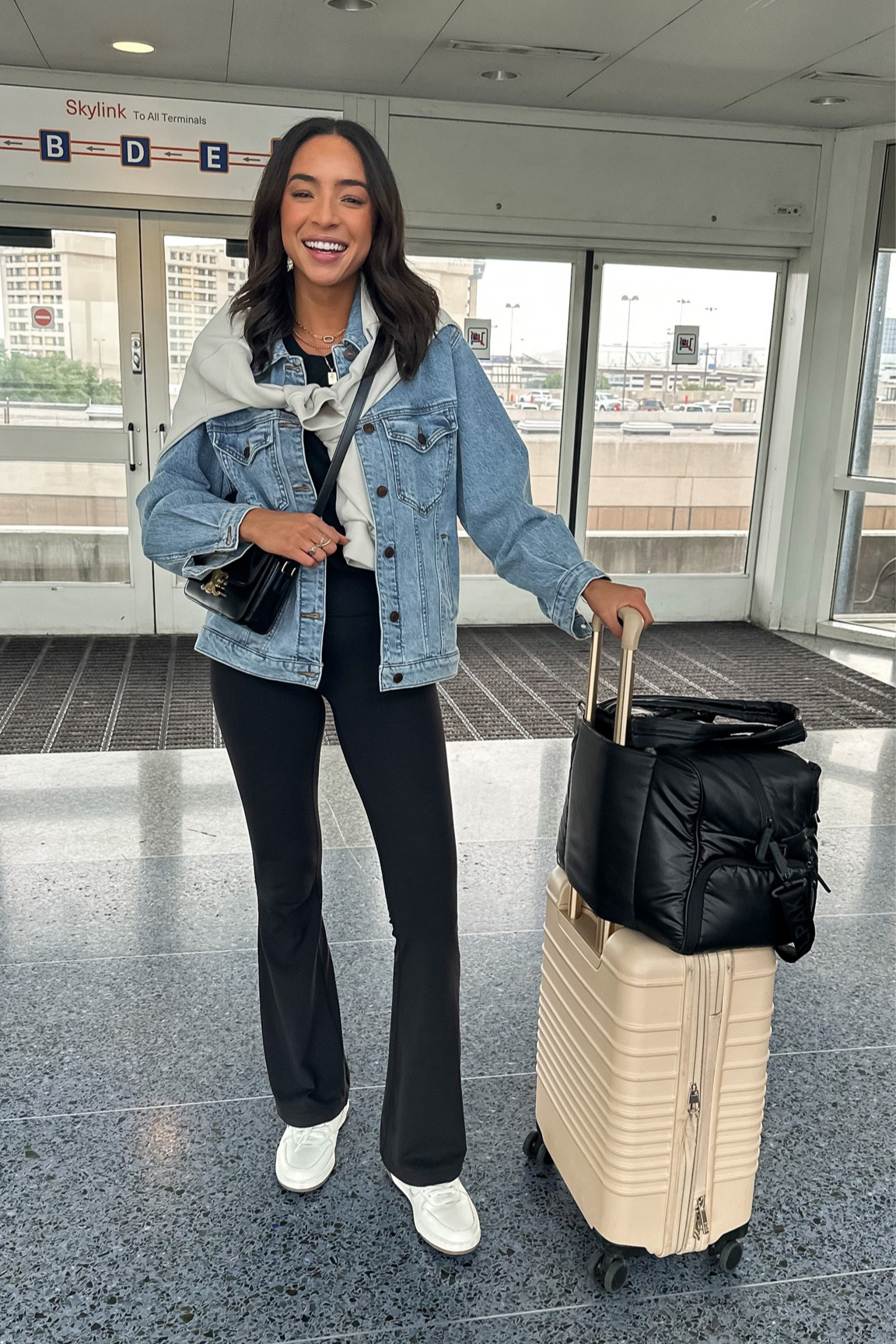 What I Wore in Palm Springs: Travel outfit ✈️ small oversized denim jacket, 6 oversized lululemon sweatshirt, 4 lululemon groove flares, small black tee 

#LTKtravel #LTKstyletip #LTKunder100
