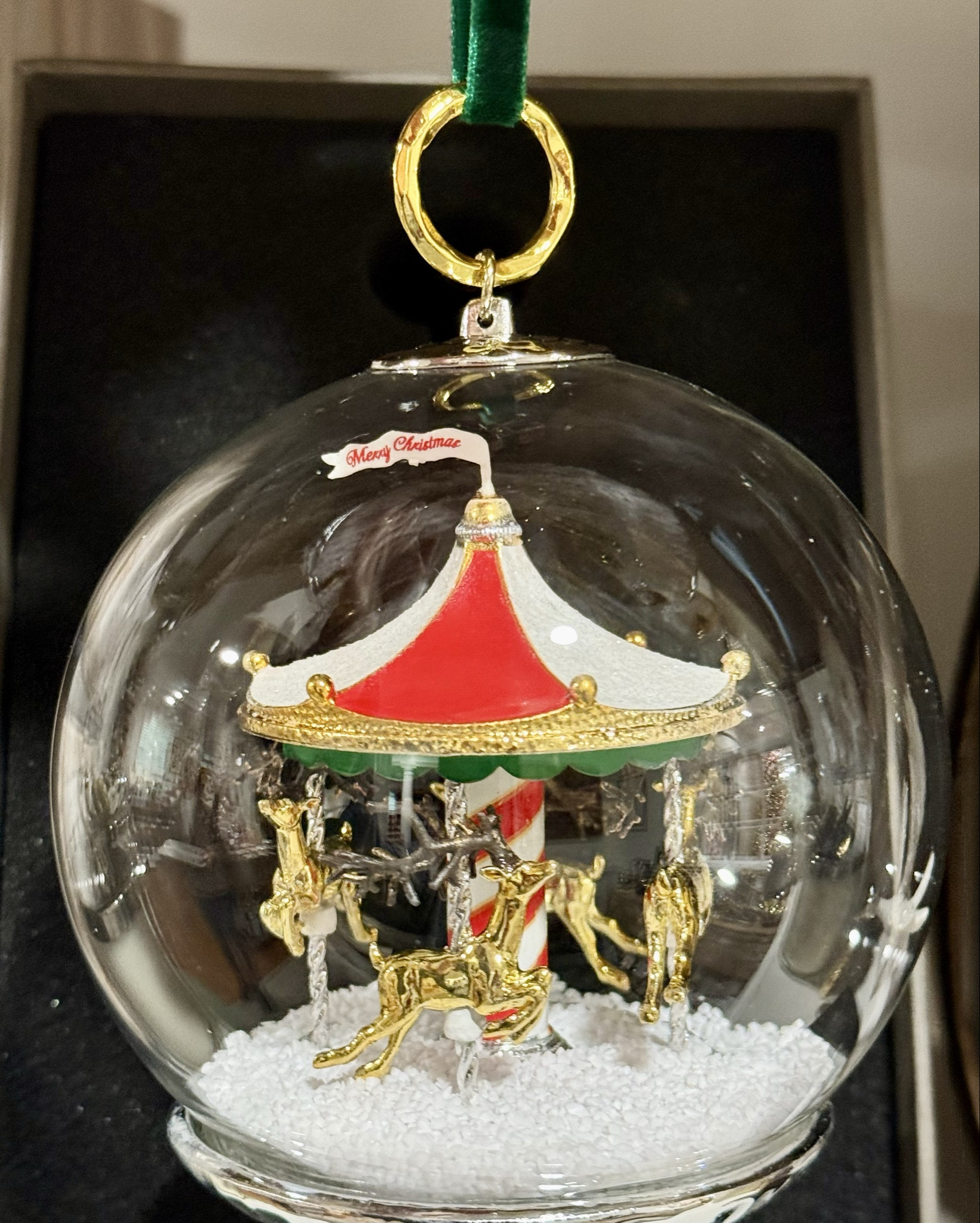 This Christmas Merry Go Round Snowglobe Ornament is beautiful! This would be beautiful hanging on the spiral ornament stand!  

#LTKSeasonal #LTKHoliday #LTKGiftGuide