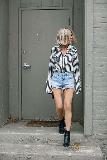 The perfect transitional look between summer and fall // black and white stripped button down, jean shorts, black boots, vintage Chanel purse, gold jewelry 🖤

#LTKstyletip #LTKSeasonal #LTKshoecrush