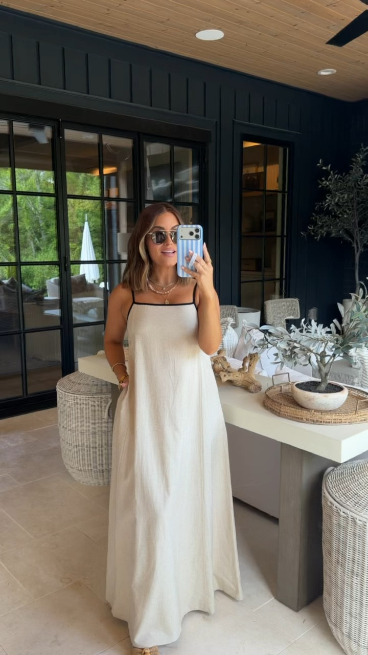 Wearing a small in this linen maxi dress— would be so cute for the beach, family beach photos, summer parties, etc! The linen fabric is such great quality + the perfect lightweight material for summer! I also love the added black detail on the neckline- just adds an elevated touch. It also features adjustable straps & pockets! Again, could easily dress this up more with a fun handbag/clutch, fun earrings or necklaces, etc  I’m 18 weeks pregnant & it’s bump friendly! 

#LTKTravel #LTKBump #LTKSeasonal