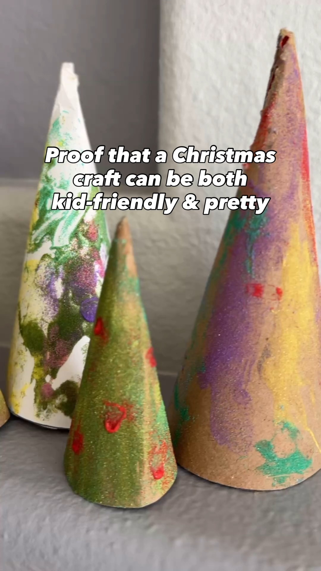 This one was so fun, and I love how the finished pieces look on my mantel 😍

I made the cones from repurposed cardboard, but you can also grab craft cones at most craft stores. Just paint on some glue, pour the sand, and let it dry! I love that this craft sand comes in bottles that control the pour, perfect for kids!

#LTKKids #LTKSeasonal #LTKHoliday