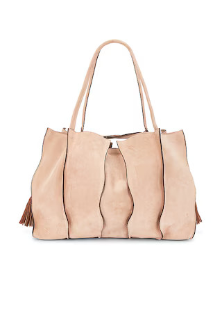 Adria Pleated Wave Tote Bag | Revolve Clothing (Global)