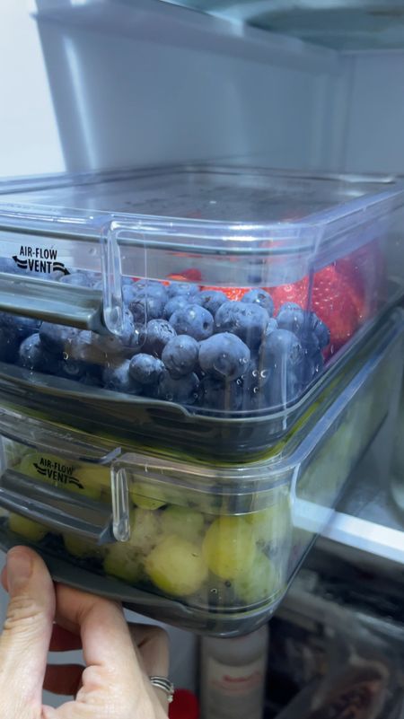 Shoutout to our favorite produce storage containers! Our strawberries and blueberries do so well in the refrigerator when stored in these did in these produce containers! Berries, grapes, even fresh cut fruits last so much longer in these clear produce organizers. 

Everything stays fresh and stored at in its optimal conditions - with air flow vents that can be closed airtight or left open for air flow depending on the needs of the food you’re storing. Additionally, things that need extra humidity get it via a water tray or otherwise produce stays high and dry in water draining / colander style straining containers. 

You can choose to wash your produce first and then store (this is what I do with all the fruits my kids love to snack on) wash first so it’s ready to eat! 
OR 
Choose to wash your produce items when you’re ready to use them. Often times I store veggies unwashed and then wash them in the container (that strains off water) then use as needed. 

You can even store cut produce in these boxes too! The excess juice run off into the drip tray to keep fruit from getting waterlogged. 

I cannot sing their praises enough because they keep the fresh produce accessible and visible in the refrigerator so my kids eat it all before it goes to waste. This is must have for kitchen organization!

#LTKxWalmart #LTKHome #LTKVideo