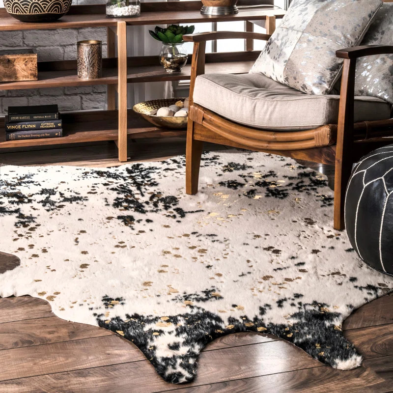 Chehalis Contemporary Faux Cowhide Power Loom Black/Gold Rug | Wayfair North America