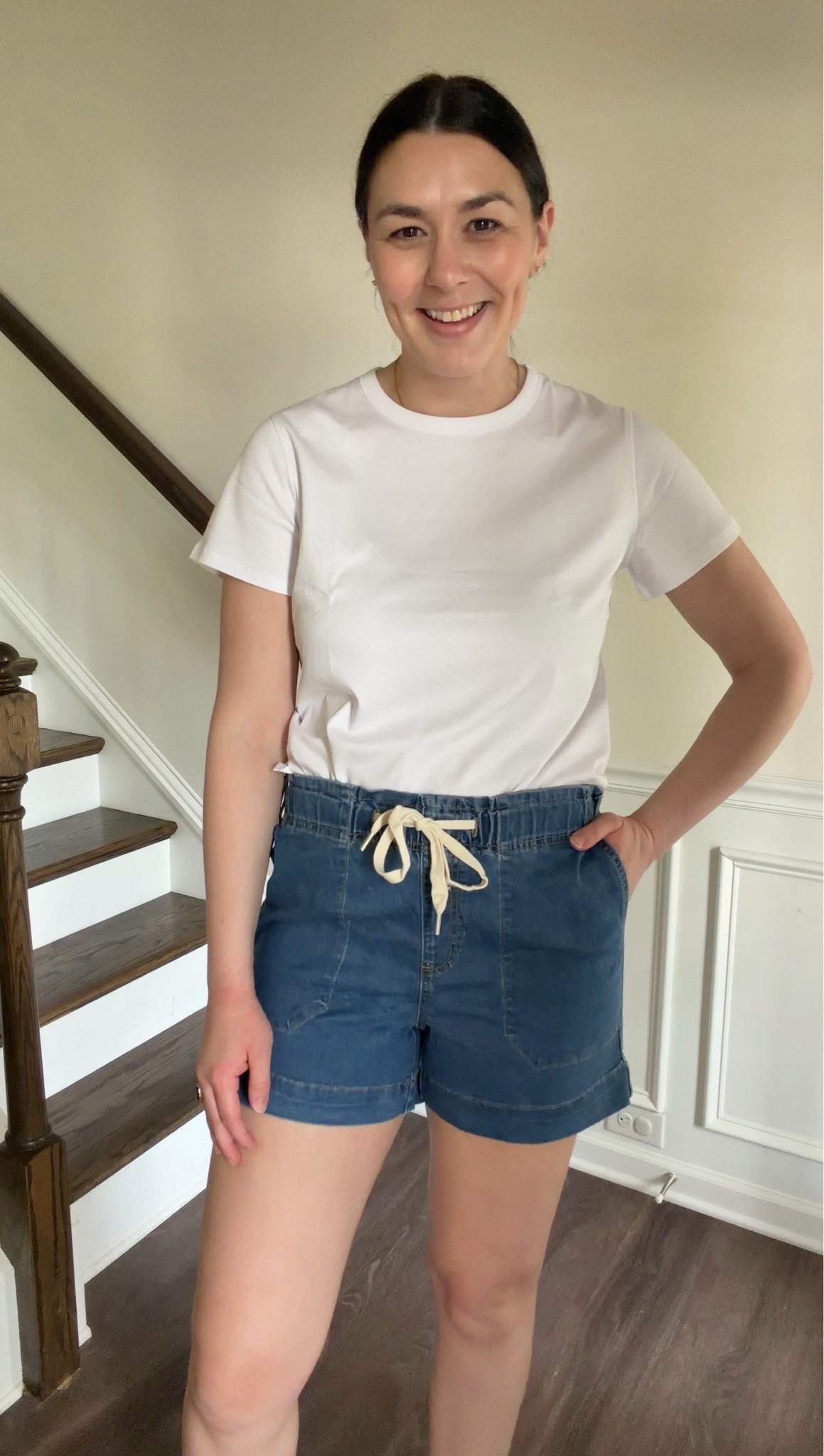 These stretchy denim shorts are the perfect mom short! They are a great length and postpartum friendly! The waistband is super stretchy (stretchy throughout entire shorts) with the cute adjustable waistband! They have pockets in the front and back too! Love the length and wash too! Run TTS or could size up for a more baggy fit! 

My top is the perfect crisp white tshirt! Wearing a large for a little more baggy fit!