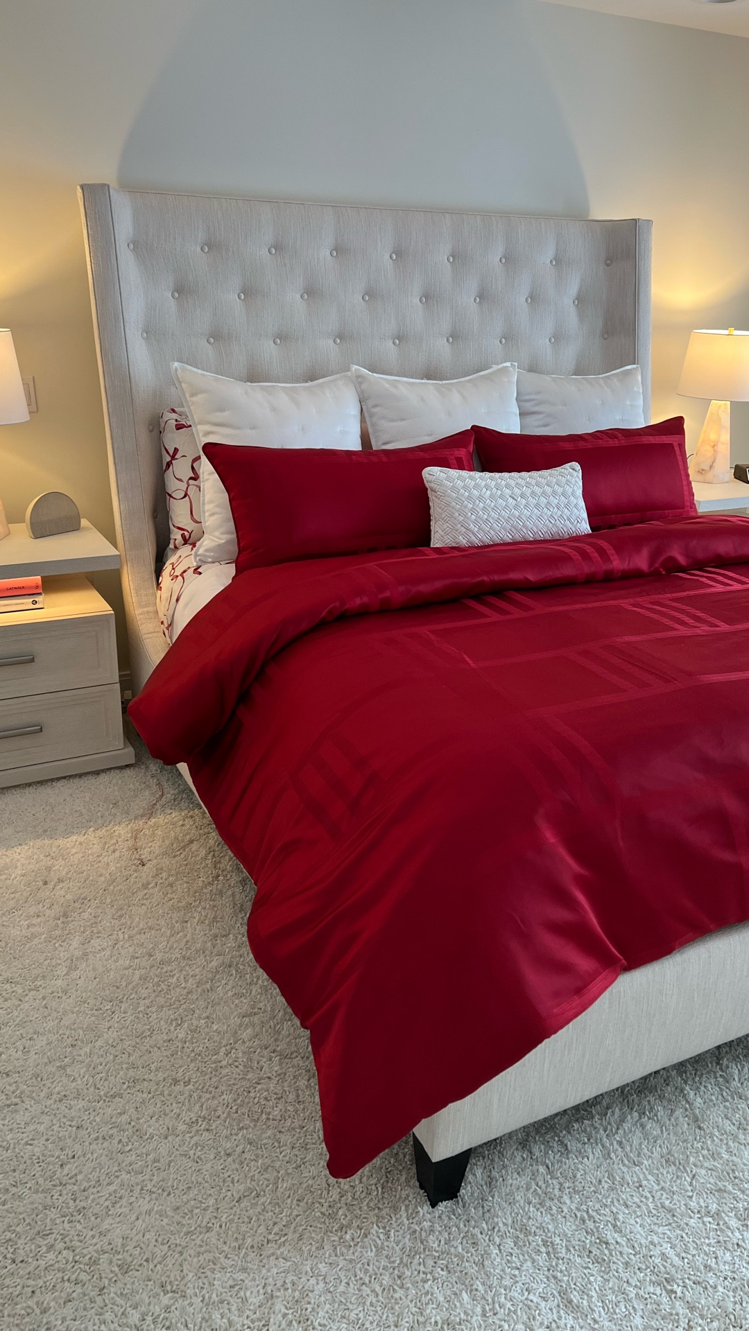 Holiday Bedding! I never thought I would be one for holiday bedding but my husband and I saw this on display at Macy’s last year and I thought it would be really fun and festive!! now just looking to add some fun decorative pillows or a plaid throw blanket! 
•
Headboard: Gormans Furniture- Bernhardt Maxime Tall
Nightstands: Value City Furniture Arielle Nightstand
Lamps: Marshall’s / Homogoods!
Bow Sheets: Pottery Barn 2025 (not available) 
Red Comforter: Macys 2025 (not available)

#LTKHome #LTKSeasonal #LTKHoliday