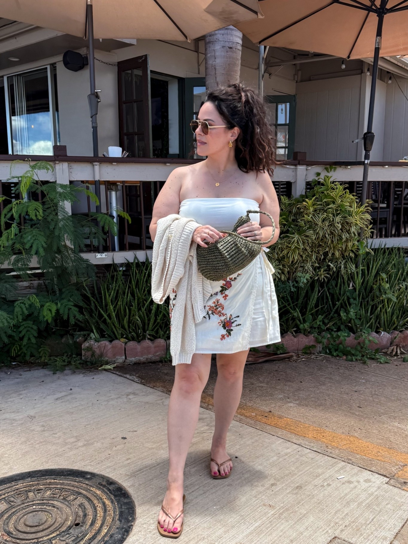 midsize vacation outfit, hawaii outfit. 

•wearing a xl in the tube top
•i am typically a 36dd in bras wearing a 38d in my fave strapless bra. 
•beach cardigan large 
•this embroidered wrap skirt is old i linked similar options. 
fave flip flops 
•green straw bag

#LTKOver40 #LTKSeasonal #LTKootd