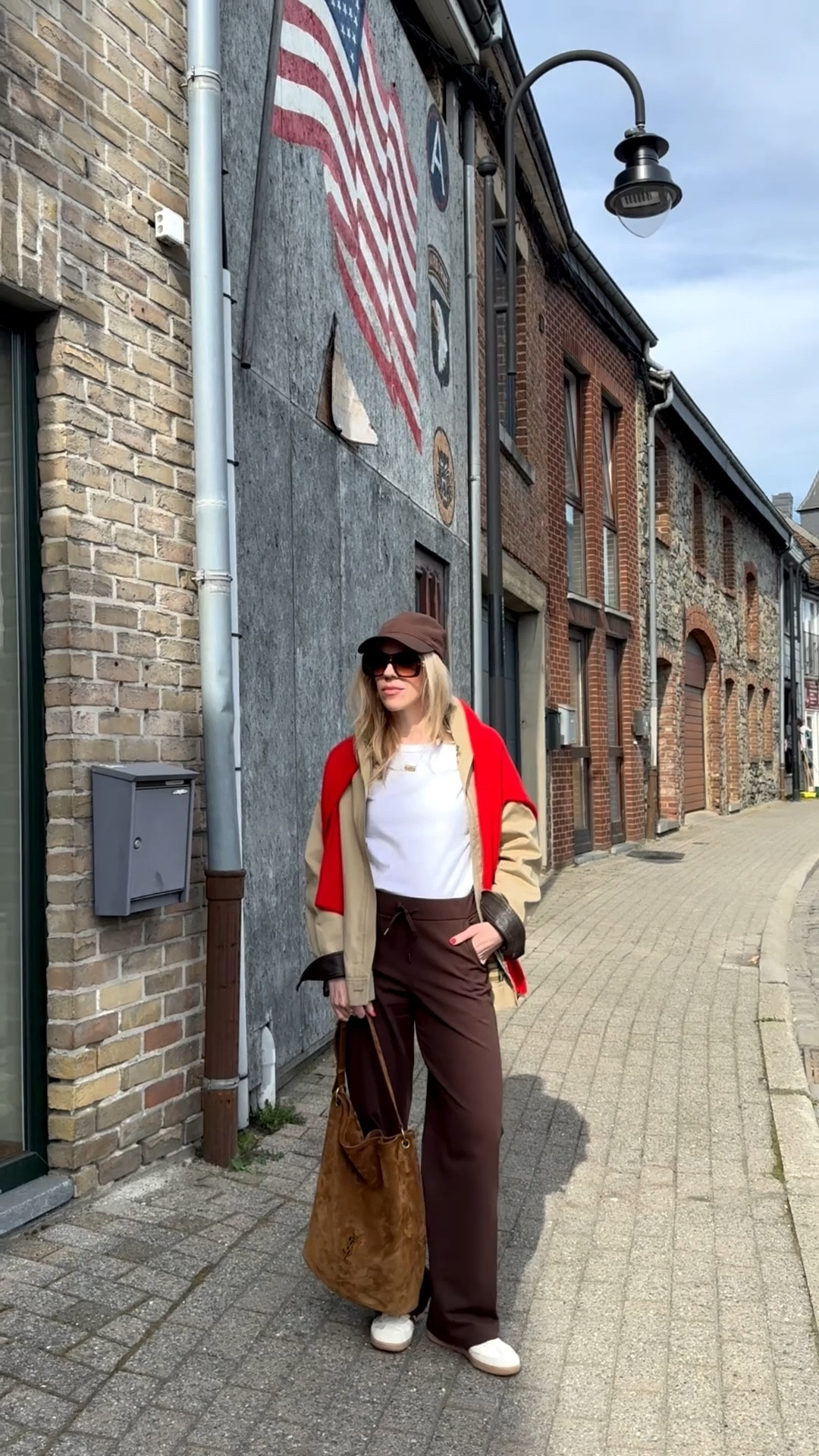 Travel look, vintage Burberry trench, Amazon jogger pants, suede YSL bucket bag, casual chic outfit 

#LTKActive #LTKSaleAlert #LTKTravel