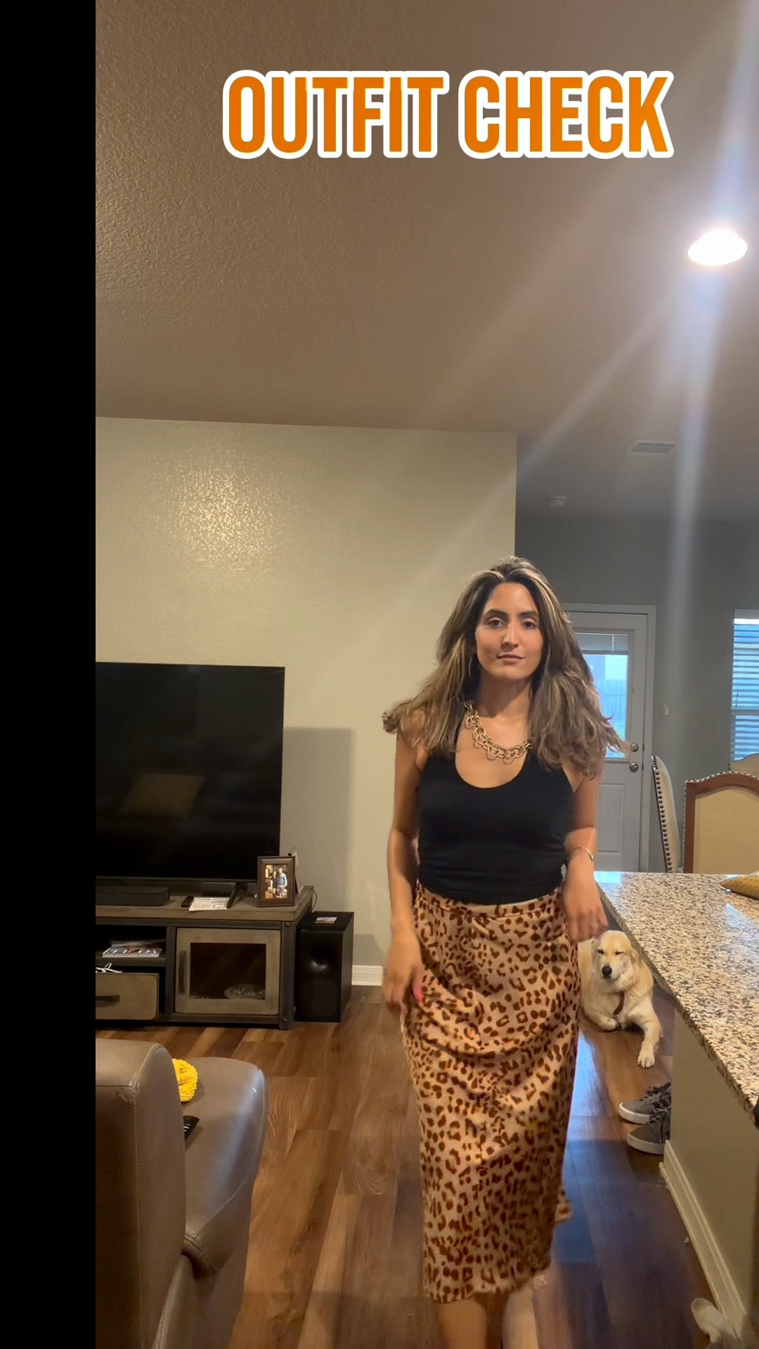 Cheetah print skirt and a black halter top for Sunday night

#LTKgrwm #LTKootd #LTKvlog