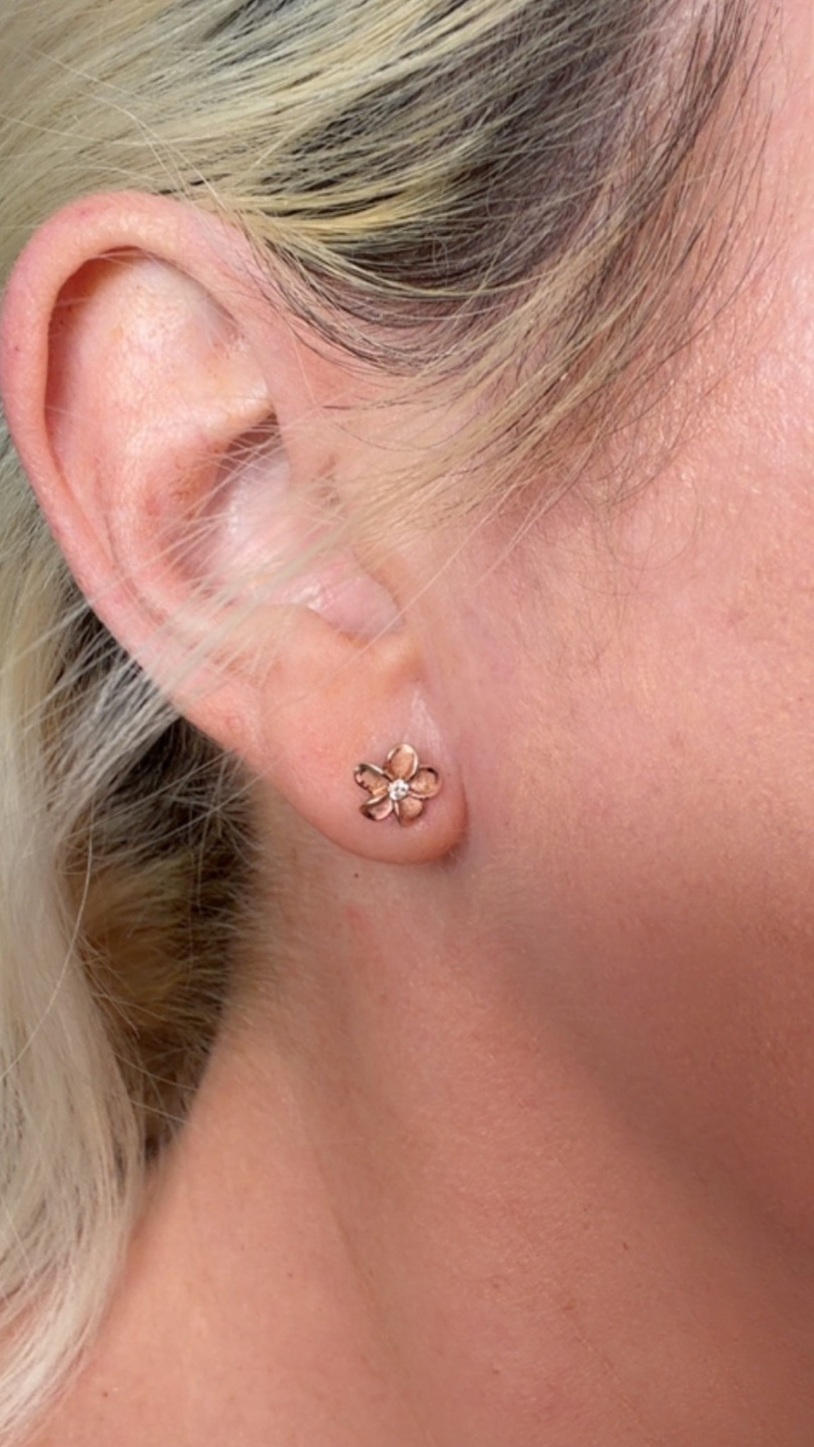 I'm so in love with these rose gold plumeria flower earrings. Small, subtle, but just enough to make me feel pulled together. Gentle for sensitive ears (hypoallergenic) and comfortable. Would be perfect for a tropical island getaway vacation. 

 #LTKMothersDay #LTKdayinmylife