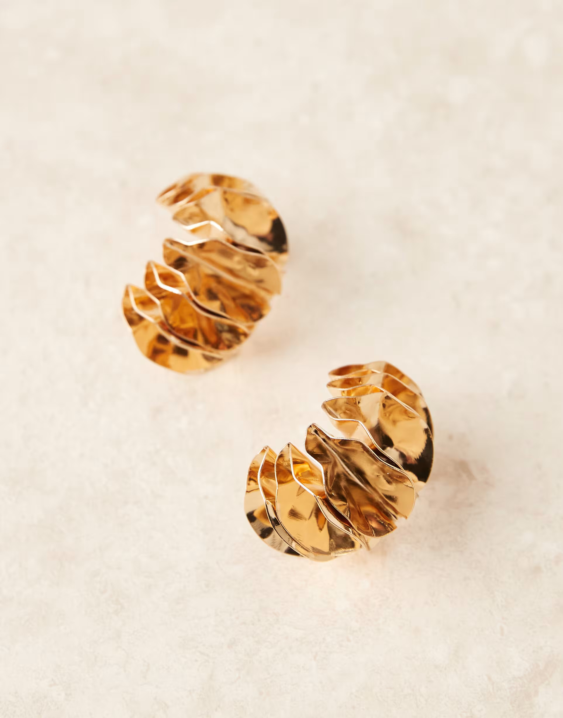 ASOS DESIGN hoop earrings with folded petal detail in gold tone | ASOS (Global)