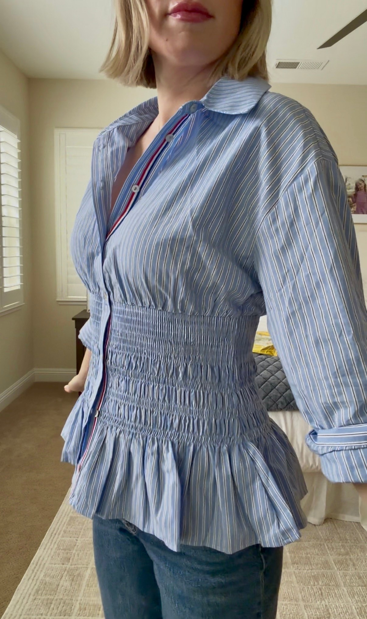 This smocked waist blouse is on sale at @Anthropologie It will be very cute in spring with white denim. Wearing size medium. 

#LTKSeasonal #LTKOver40 #LTKSaleAlert