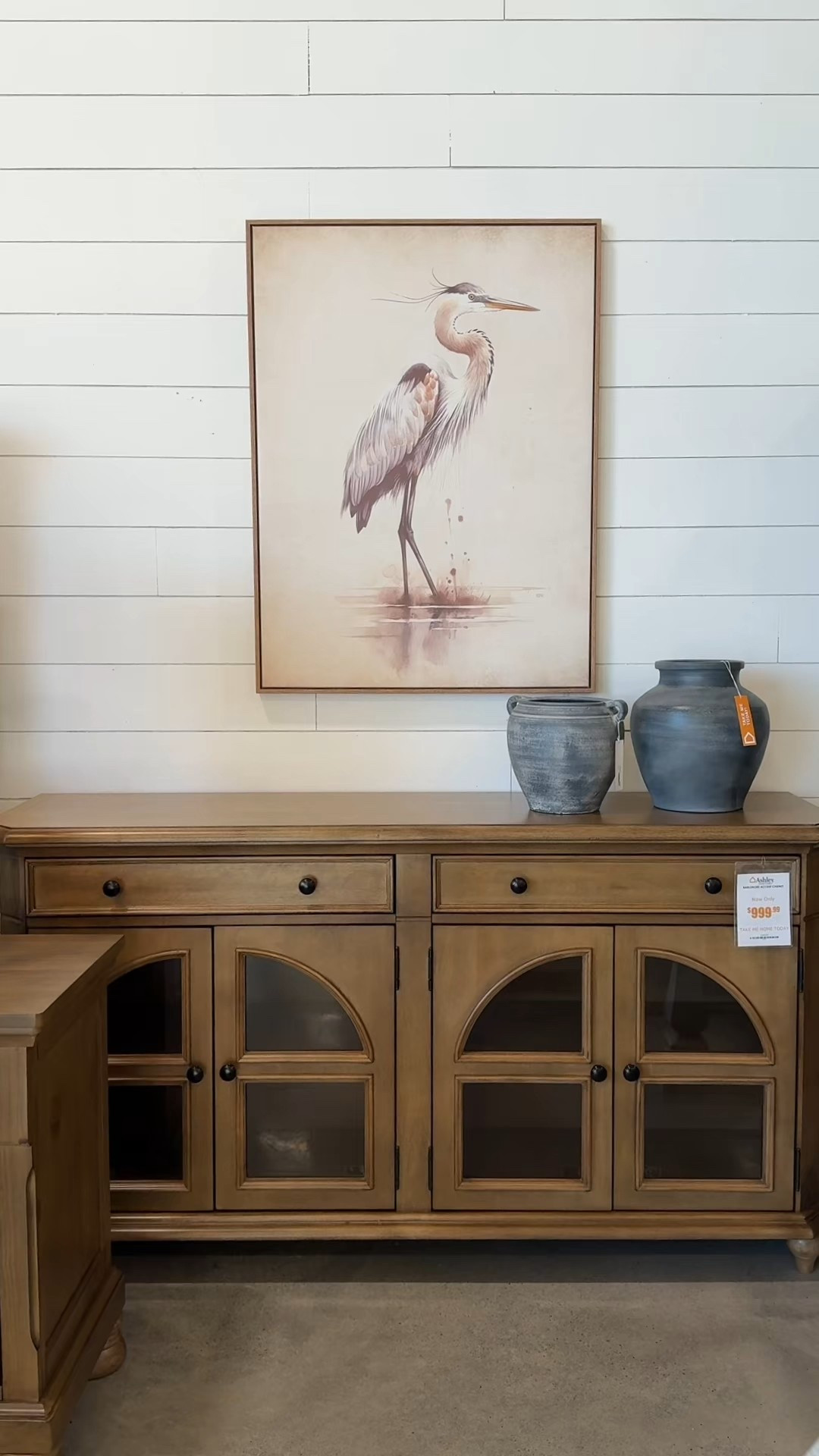 The Barlomore Accent Cabinet from Ashley Furniture has such a beautiful, classic presence. 🤎 The warm brown finish paired with the arched glass doors gives it that effortlessly collected look, while the drawers and adjustable shelving offer plenty of practical storage. Perfect for displaying dishes, books, decor, or even media pieces, this cabinet feels right at home in a dining room, living space, or entryway. 🏺 I’ve linked this piece along with other similar accent cabinets worth checking out! ✨ #Sideboard #Credenza #DiningRoomFurniture

#LTKSaleAlert #LTKHome