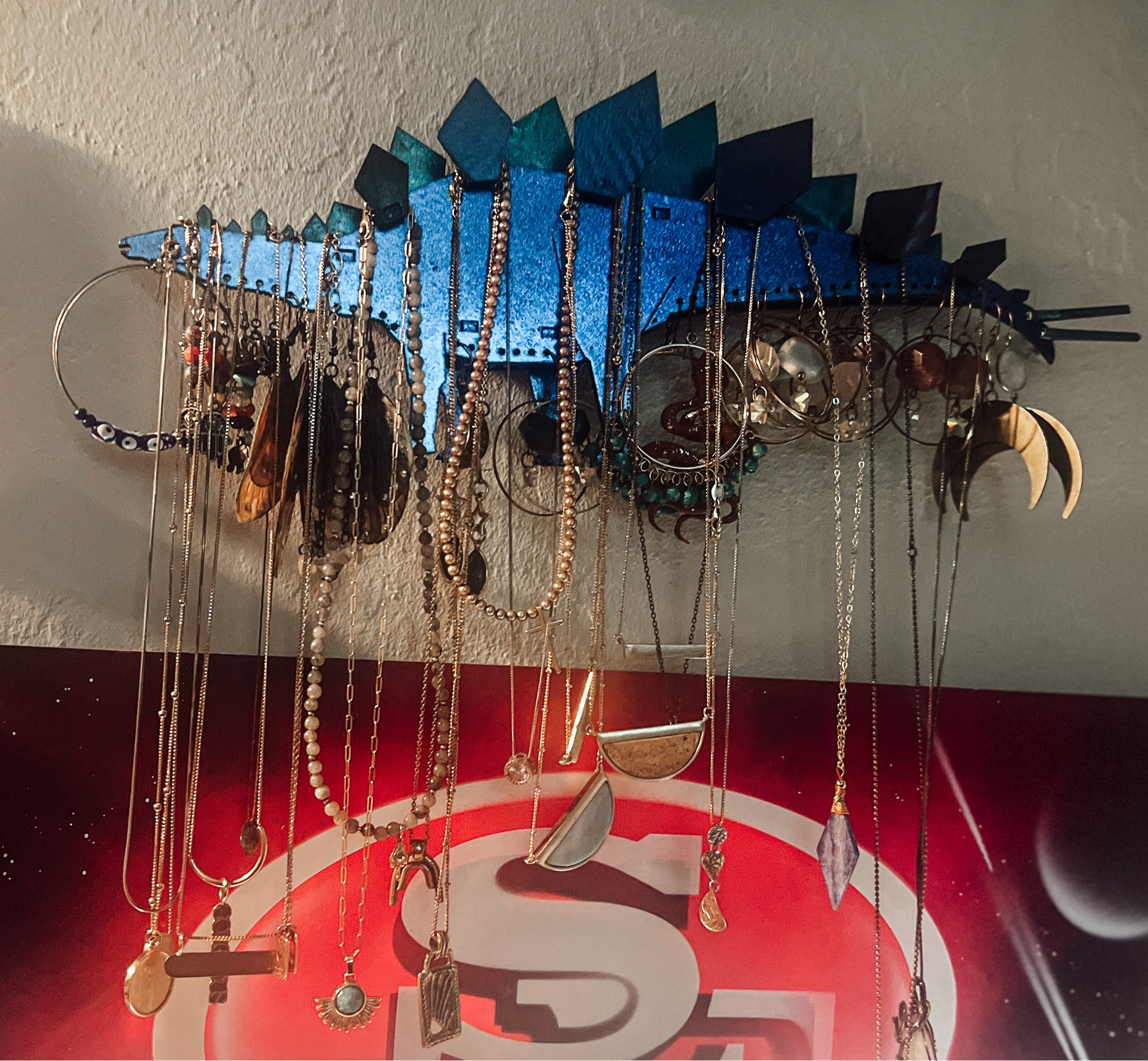 🌿 Embrace your inner boho goddess with this stunning stegosaurus wooden jewelry  holder from Etsy

✨ Elevate your space, celebrate your style! 

I painted mine with color changing paint. One angle it looks blue and the other angle it looks purple. 

#BohoChic #WoodenJewelryHangers #GoddessVibes #EtsyFinds #HippieStyle"
 #BohoJewelry #HandmadeDecor #EtsyShop #WoodenArt #BrownSkinBeauties #40PlusStyle #HippieFashion #EcoFriendlyLiving #UniqueGifts #JewelryOrganization

#LTKhome #LTKGiftGuide #LTKHoliday