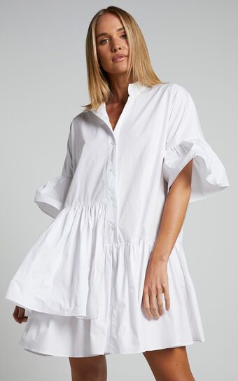 Elowen Mini Dress - Button Up Asymmetrical Tiered Smock Dress in White | Showpo (US, UK & Europe)