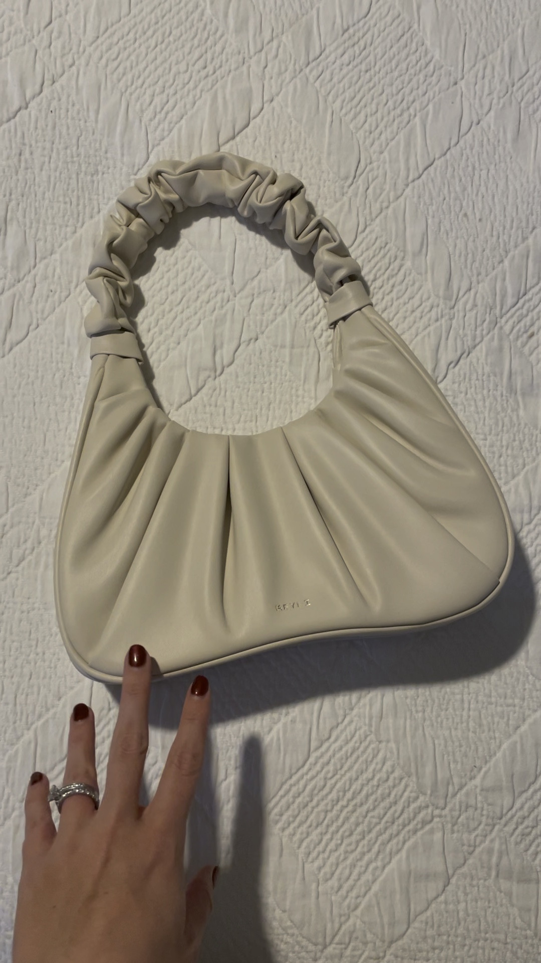 Ruched handbag in light beige / creamy white. Has magnetic closure, fits full size wallet, phone & more. Also comes in a larger size and more colors.

Amazon find, found it on amazon prime

#LTKsalealert #LTKitbag #LTKGiftGuide