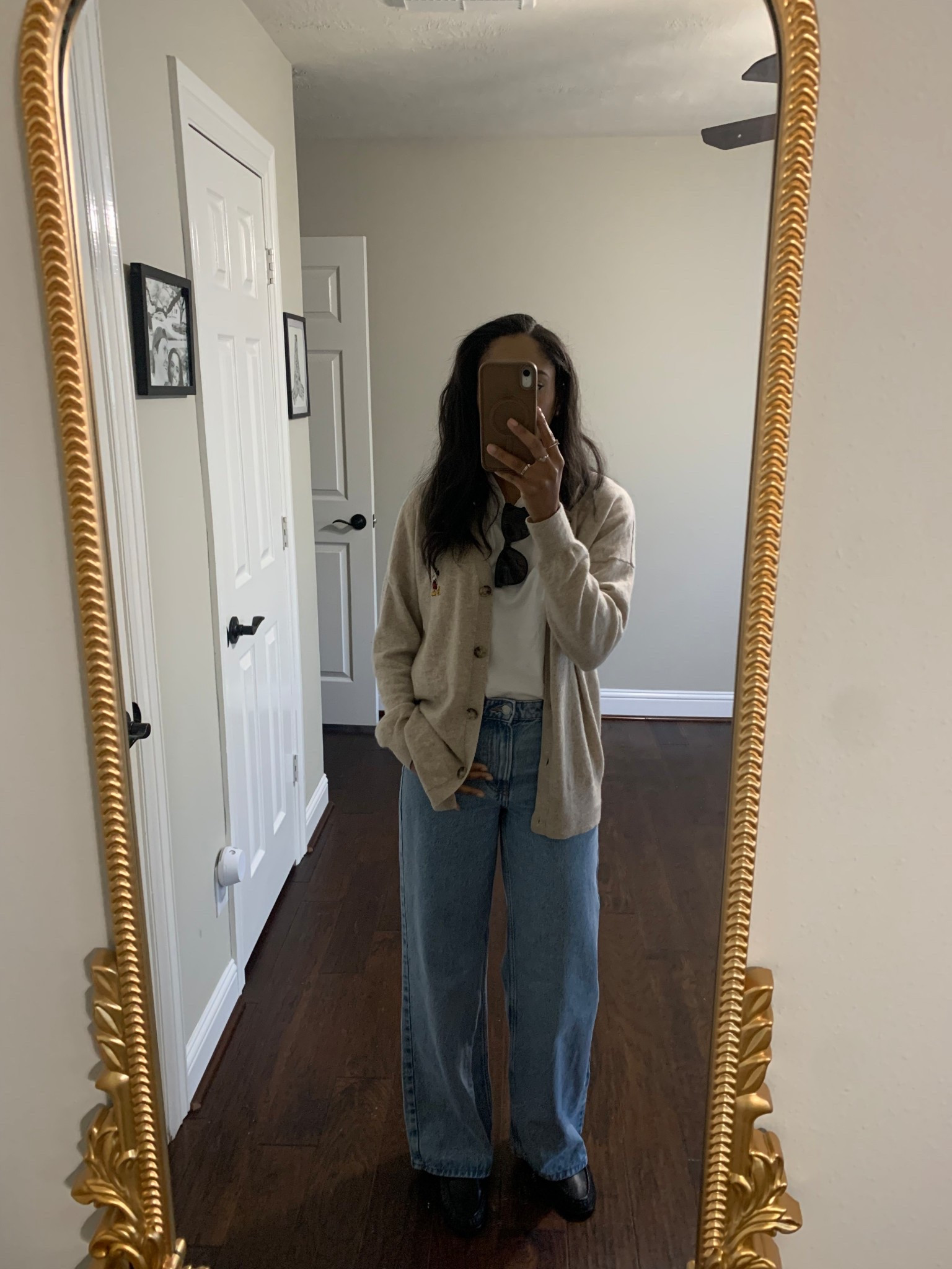 OOTD- My favorite cashmere cardigan featuring Mickey Mouse, H&M denim wide leg jeans, a cozy pocket t-shirt from Zara, and ASOS penny loafers. 

#LTKSeasonal #LTKootd #LTKFindsUnder100