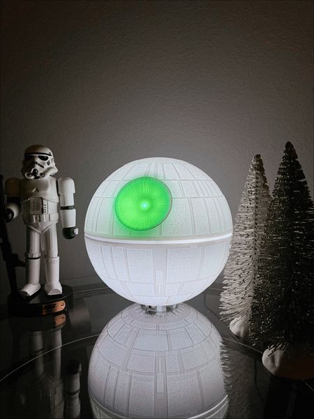 The best holiday tree topper or makes for a great tableside decor for all #StarWars fans! 

Hallmark Keepsake 2022, Star Wars: A New Hope Collection Death Star Musical Tree Topper with Light. 🌑✨

Experience a sound and light show with this Star Wars Death Star Christmas Tree Topper with continuous light effect. Press the button on the remote #lightsaber control or on the base of the tree topper to and watch it illuminate and hear music from the "Star Wars: Main Title." 😍 It’s beautiful!

#LTKHoliday #LTKSeasonal #LTKGiftGuide