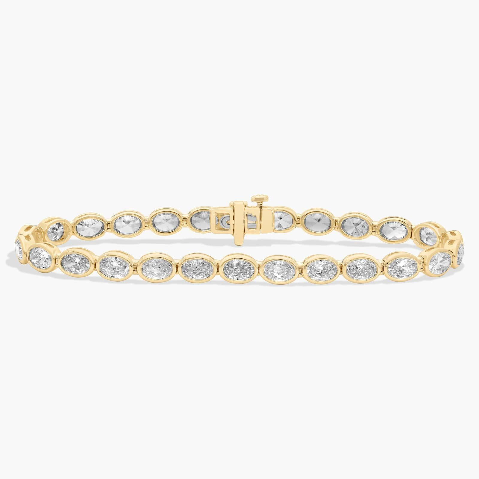 7 "" Oval Cut Diamond E/w Bezel Set Tennis Bracelet In 14k Yellow Gold (10 ct. tw. - H-I / SI1-SI2) | Blue Nile