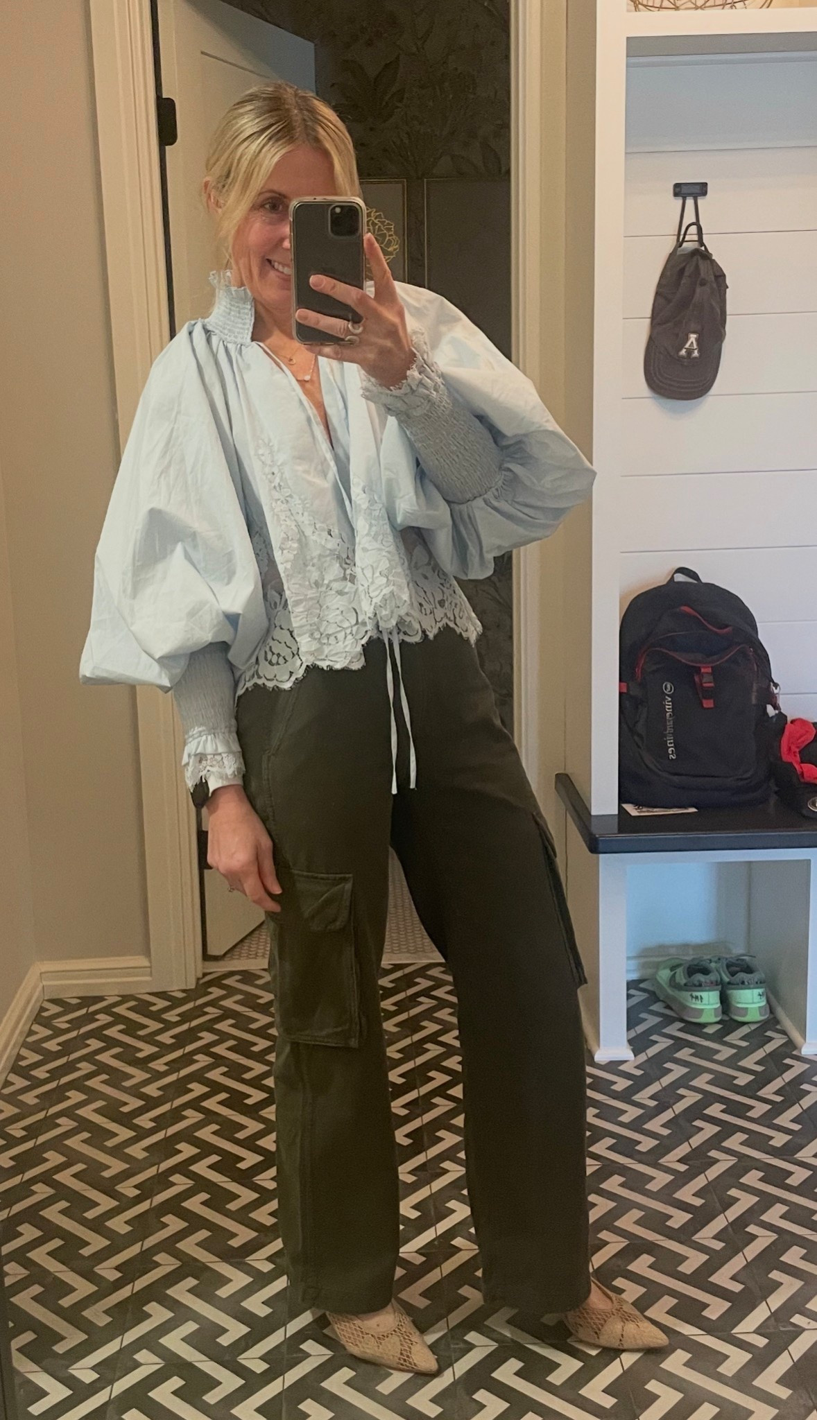 Back at it with this over exaggerated blouse but I love it! 🩵 Paired it with these Madewell cargos that are on major sale! Size down!! Try this color combo. Add a pop of red if you dare! 💚🩵❤️

#LTKootd #LTKOver40 #LTKSaleAlert