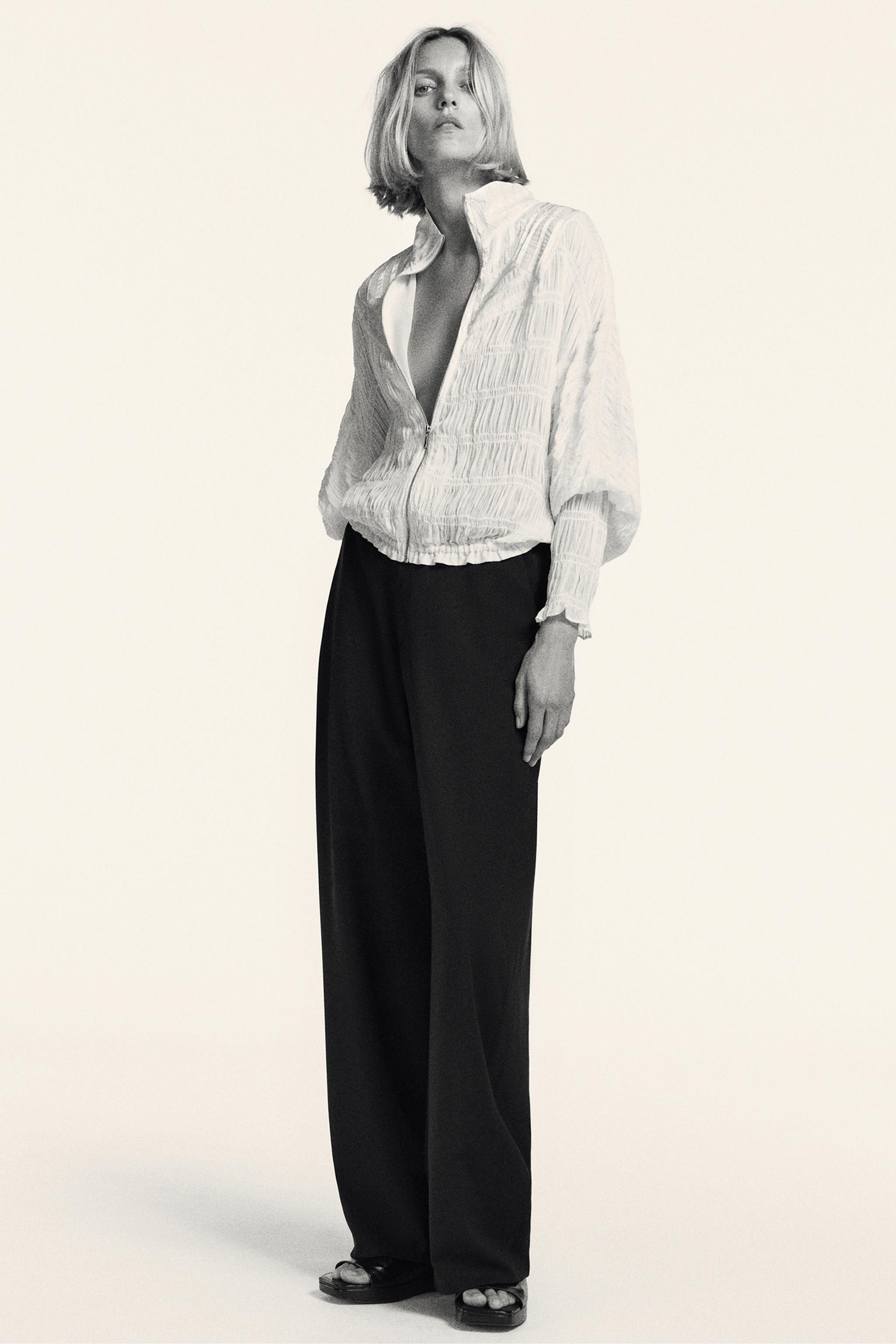 ZARA WOMAN COLLECTIONTrousers with a main fabric made of wool yarn. Mid-waist with belt loops. Si... | Zara UK