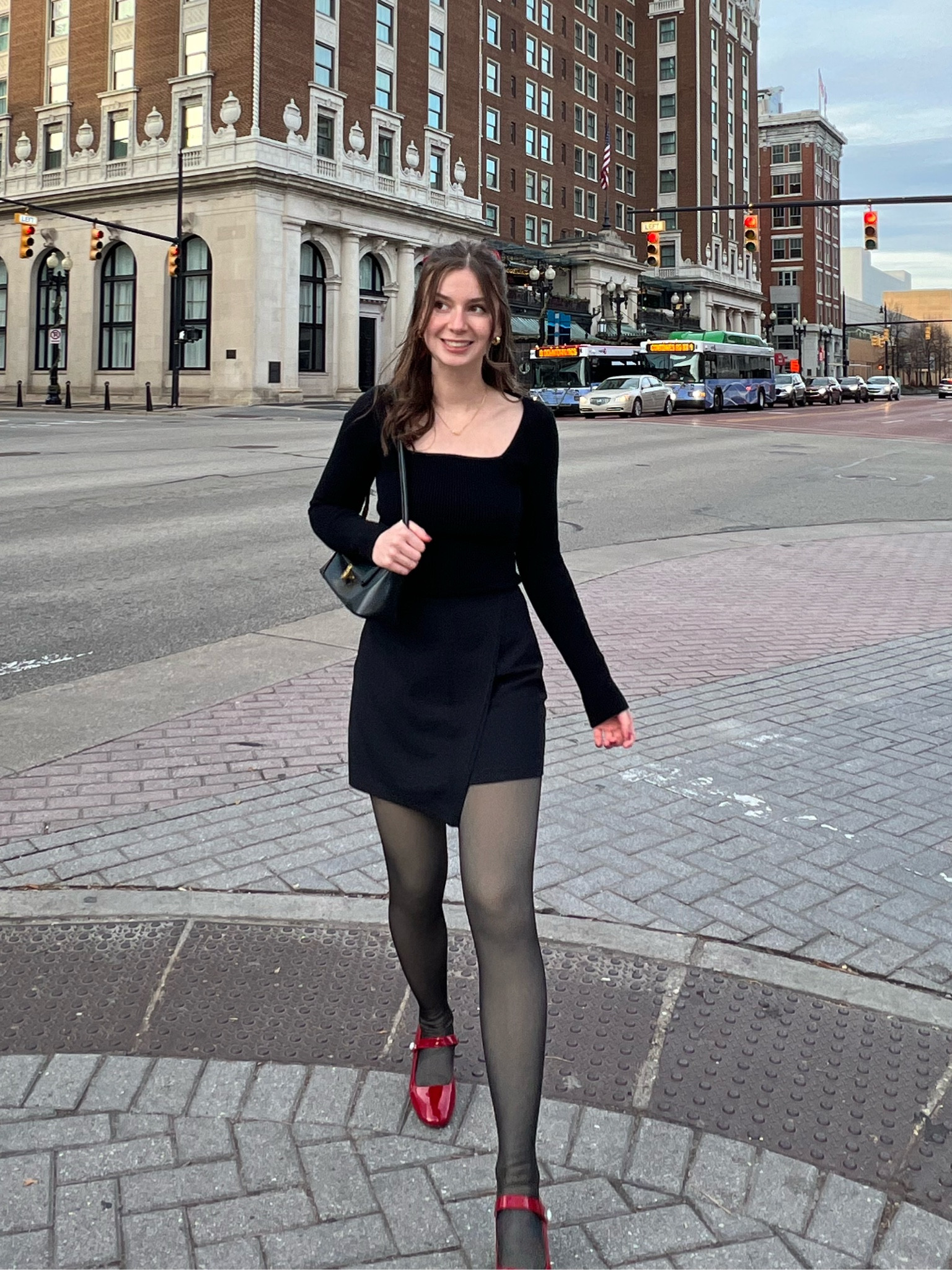 Black top, mini skirt, cherry red shoes

#LTKfindsunder100 #LTKstyletip