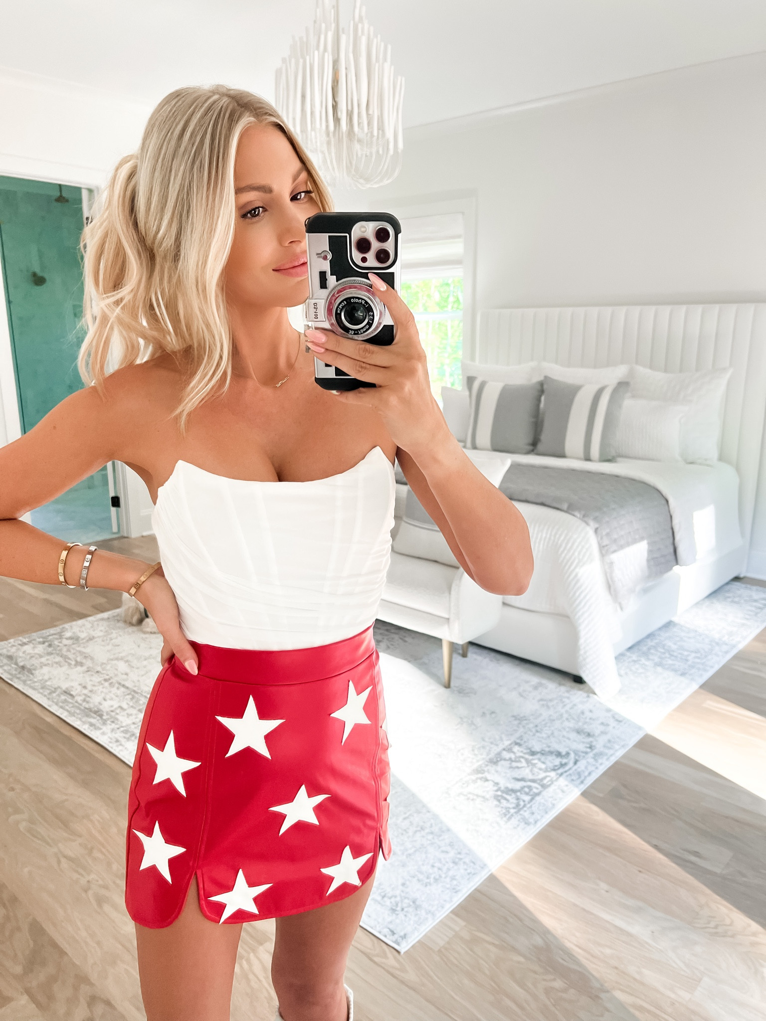 Mini skirt // gameday outfit // UGA Bama red and white // football // corset top // Amazon // knee high boots cowboy boots // fall 