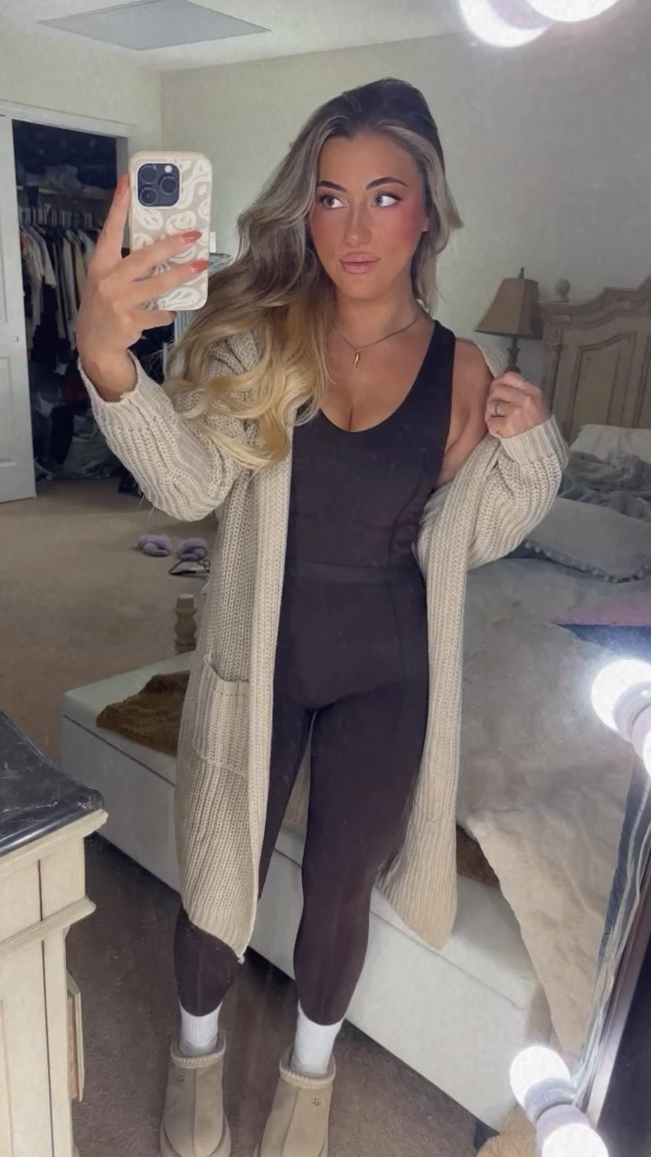Chic and cozy outfit that would be perfect for running errands or just lounging. The jumpsuit, aka the star of the show runs true to size (I got a small) and I love that it doesn’t have a front seam 🐫 it also is low back with built in cup pads so you don’t need to worry about a bra. Cardigan is a few years old but I linked a similar one. The mustard seed colored UGG Tazz slippers are hard to come by, but I found these on StockX and paid a little extra and it was so worth it. Socks are my tried and true Hue’s from Amazon

#LTKSeasonal #LTKCyberWeek #LTKHoliday