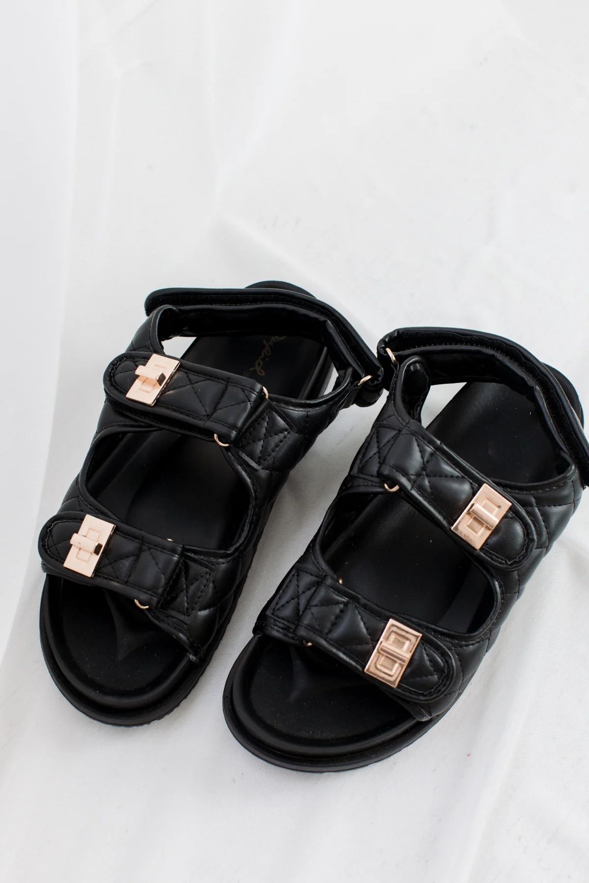 Nikki Black Buckle Sandals | The Post