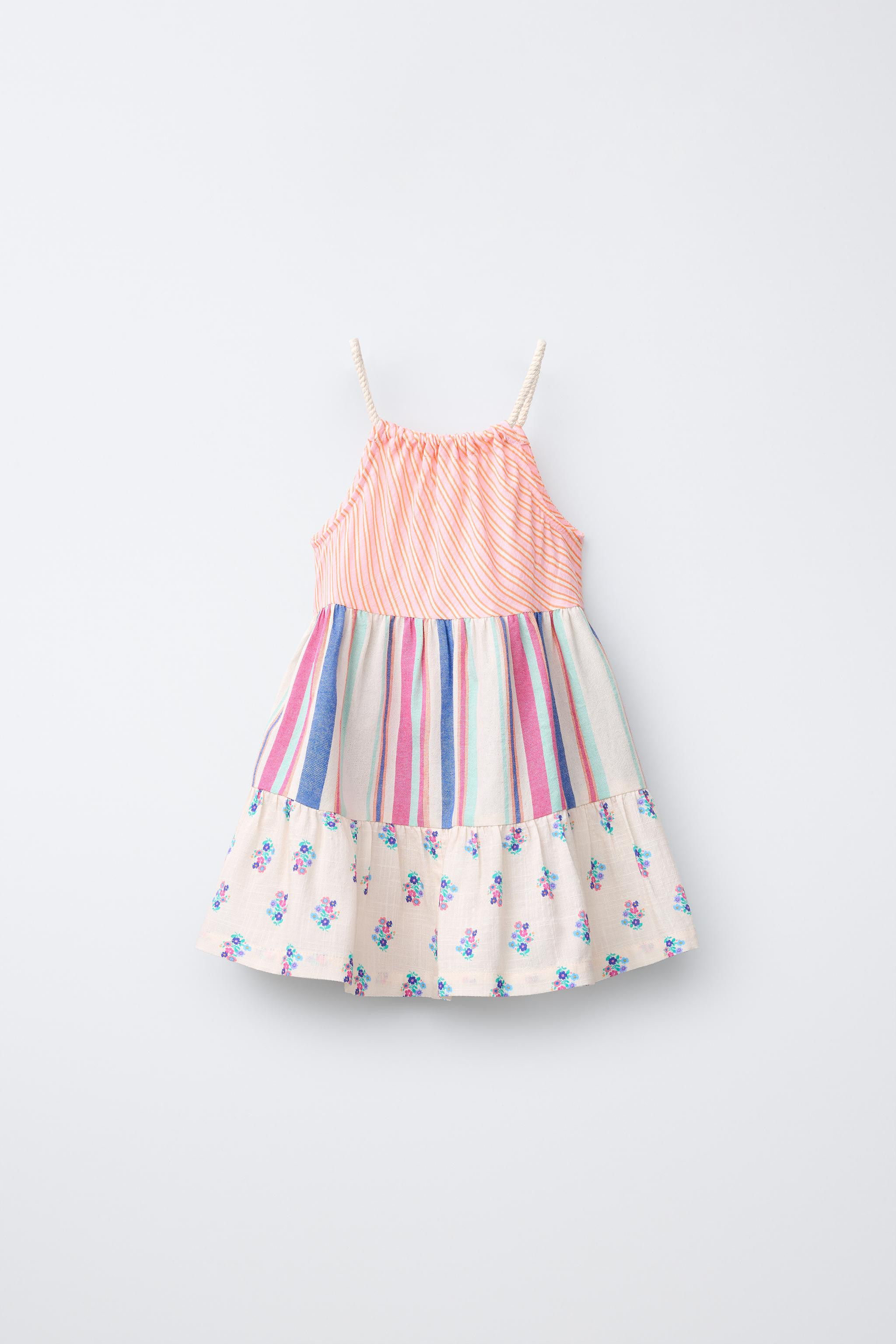 DescriptionContentsMeasurementsStraight neck dress with cord straps. Features floral and striped ... | Zara US