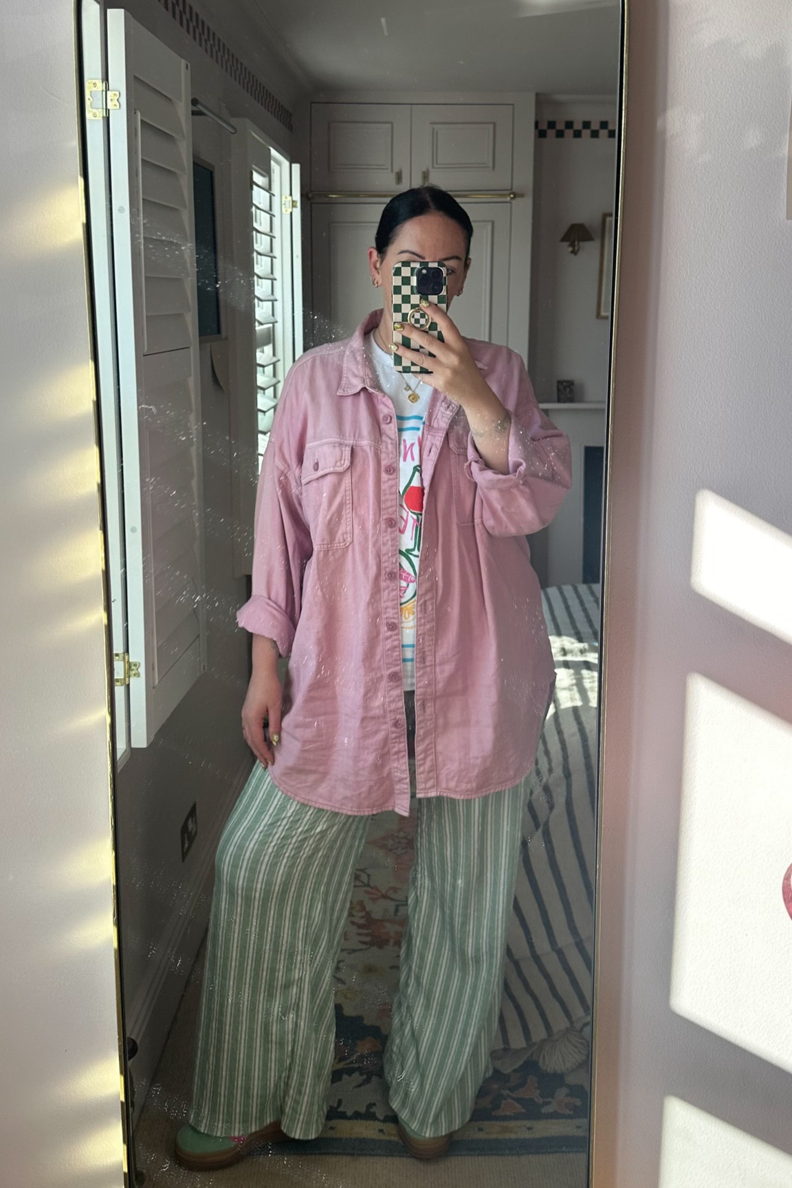 Mixing and matching like a pro! 

I'm feeling bold and bright in my green striped trousers, paired with a fun and quirky bright t-shirt and finished off with an oversized pink shirt. Who says you can't wear multiple tops at once? 

#LTKmidsize #LTKeurope #LTKuk