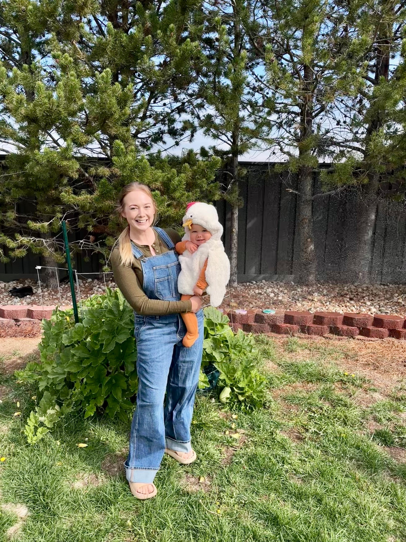 This free-range farmer’s got the cutest lil chick 🐥✨ I dressed my 13-month-old in the sweetest Baby 2-Piece Chicken Halloween Costume, layered with an orange bamboo zippie to keep her cozy in the chilly fall weather 🍂. For my look, I went with short-length overalls (perfect for my 5’3” height!) and a green ribbed Henley for easy, comfy mom style. Matching moments made spooky-season sweet 🎃👩‍🌾 #LTKFamily #LTKBaby #HalloweenCostumes #MomAndMeStyle #FallFavorites #LTKSeasonal #CozyFallVibes

#LTKFamily #LTKBaby #LTKSeasonal