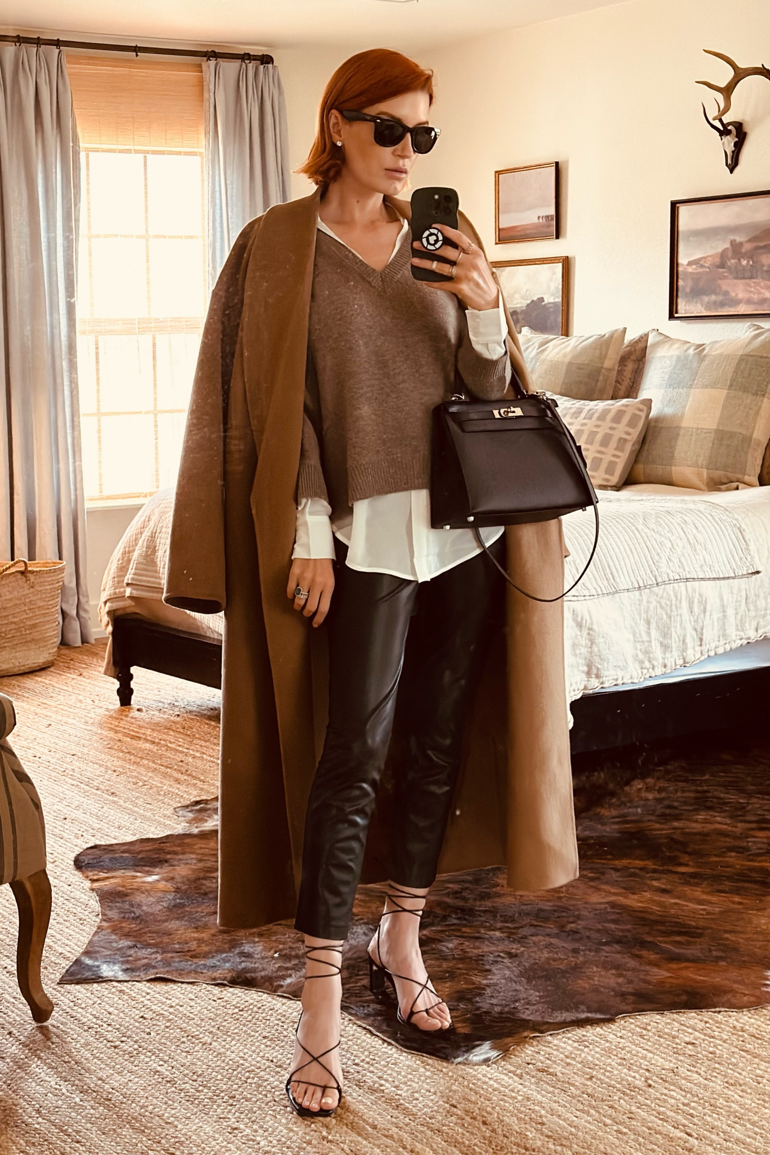 Finally pulled out my H&M camel coat for fall. Every designer makes this style and because it’s a simple silhouette, it’s a great place to save and get an inspired version at a lower price. The length is so helpful when you are trying to stay warm. 
I wore this today to travel to NY and it was so comfortable and perfectly chic for the city. 

#LTKtravel #LTKU #LTKworkwear