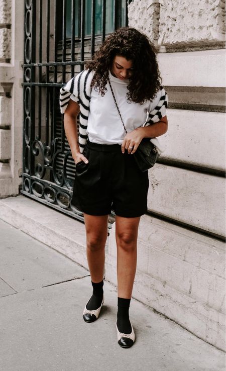 Elevate a cool summer look with tailored shorts. They’re an elevated take on a summer staple, and make for a chic look when paired with a white tee, and a striped sweater over your shoulders. Accessorize with a quilted bag, ankle socks, and cap-toe ballet flats.

#LTKStyleTip #LTKSeasonal