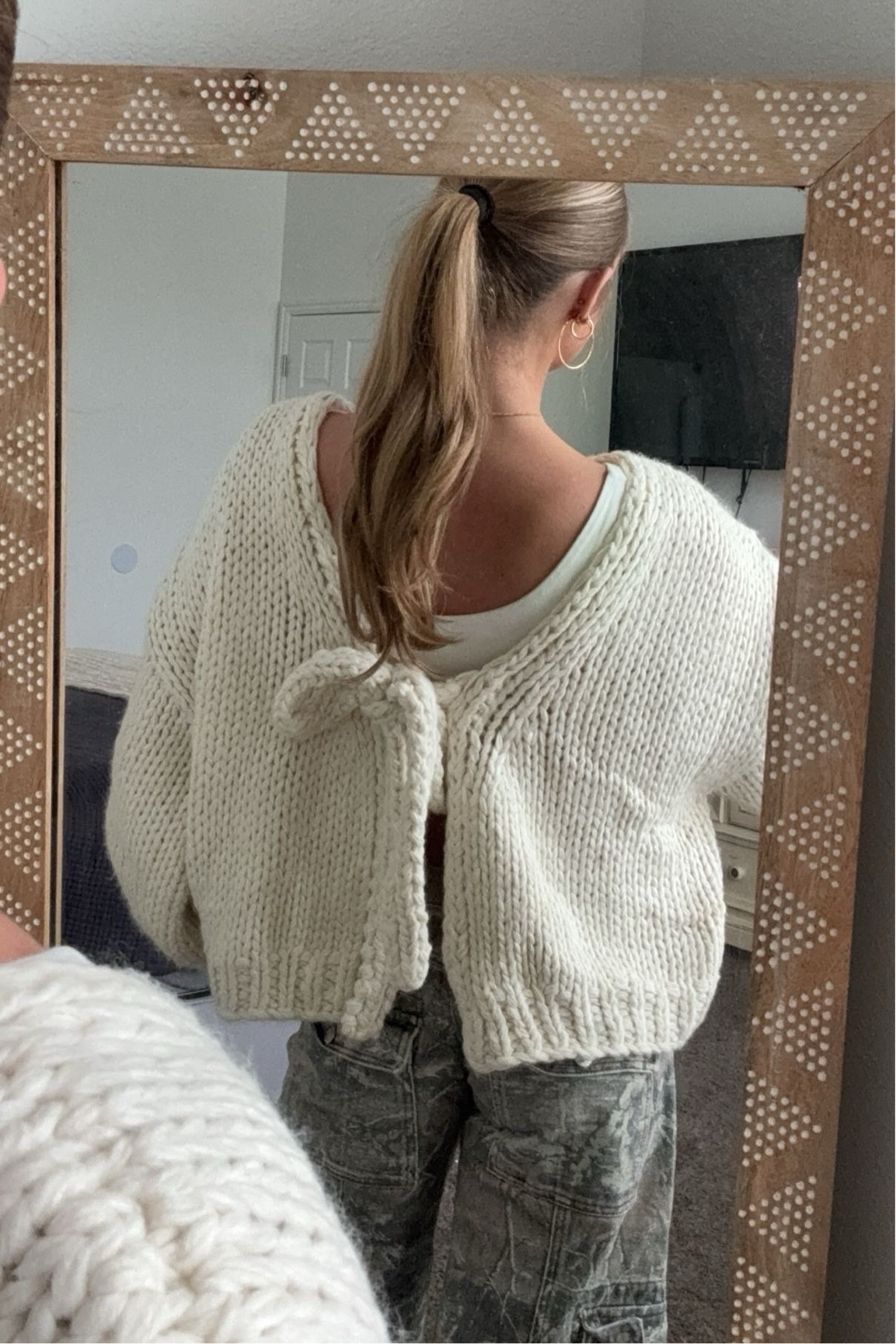 size 24 in pants, 0 in sweater 