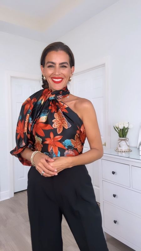 Adding exact scarf! Long bra runs small in the waist, size up. Lipstick is Ruby woo with brick color lip liner. Adding this years version of the same wide leg pants.

Scarf top, summer outfit, travel light 

#LTKTravel #LTKU #LTKVideo