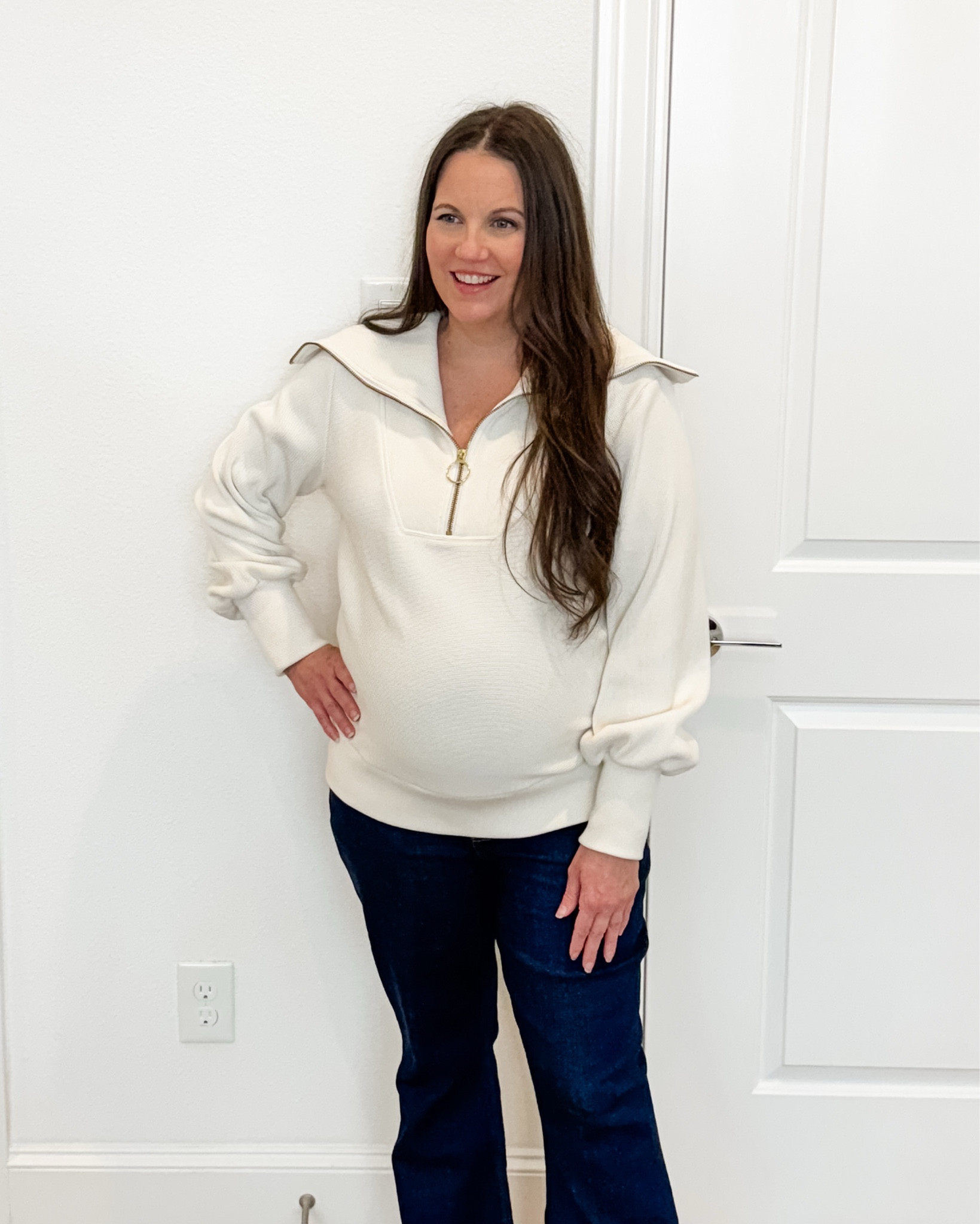 If you’re looking for an easy but elevated pregnancy outfit, this winter outfit is such a good go-to. The half-zip pullover with an oversized collar feels modern and cozy, paired with flattering dark blue bootcut flared jeans that truly are the best maternity jeans. Add brown heels and you’ve got a bump-friendly dressy casual outfit that works beautifully for everyday winter wear.


#LTKOver40 #LTKSeasonal #LTKBump