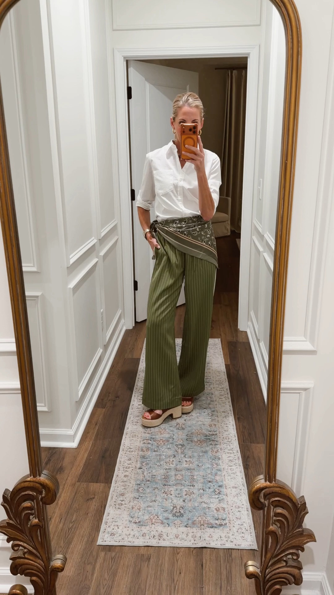 Today’s outfit of the day is from loft! I love these trending track pants and scarf detailing!!! I added a crisp white shirt and my bubble bar jewelry. Everything is a size extra small.
