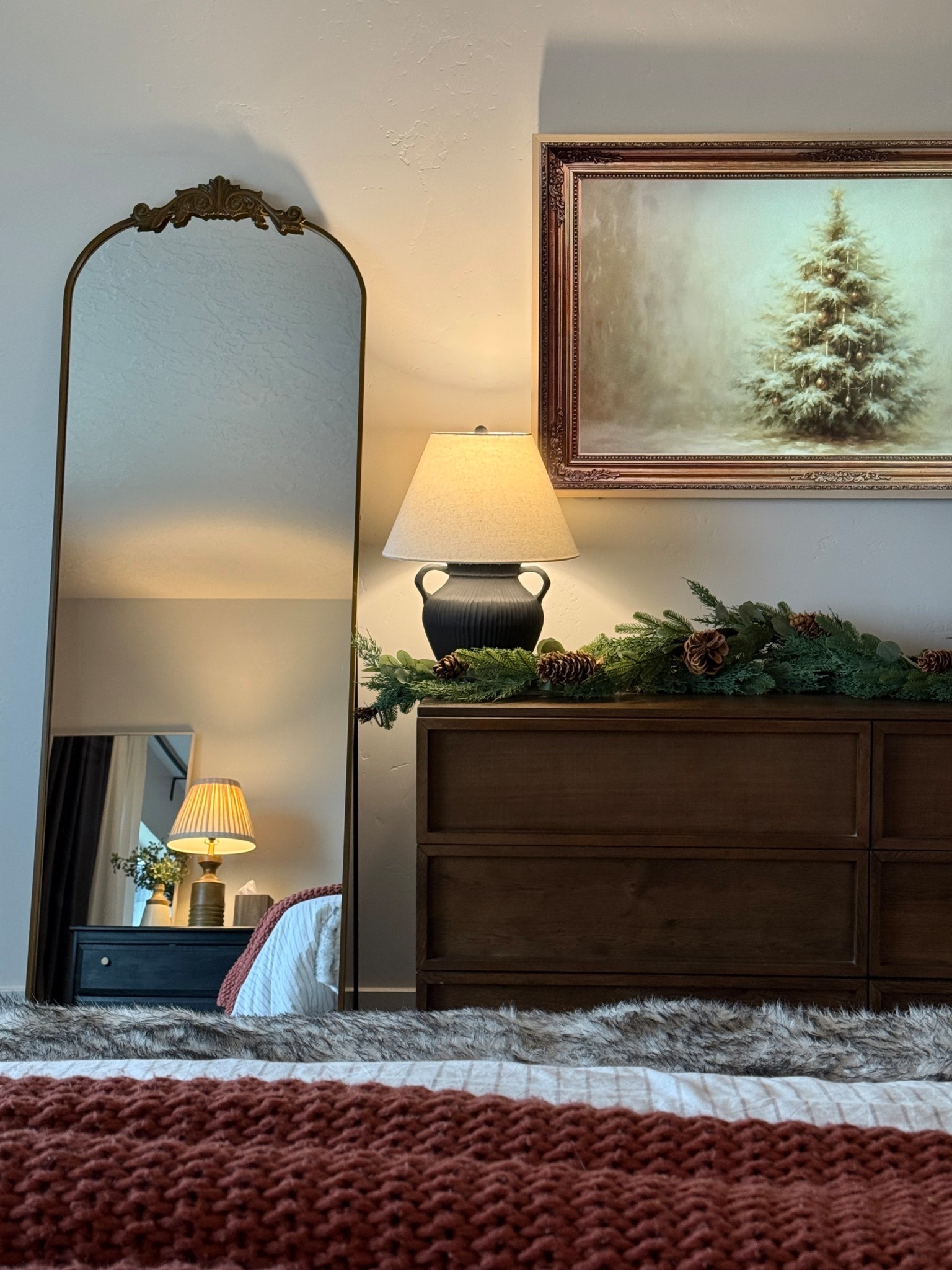 This mirror is the best price for such a high end look. It’s 6 feet tall. It has a stand that folds out the back, or it can attach to the wall. It has the most perfect bronze color option, along with other pretty choices. 
And getting an art TV in our bedroom has been so nice. We love this whole corner. 

#LTKFindsUnder100 #LTKHoliday #LTKSaleAlert