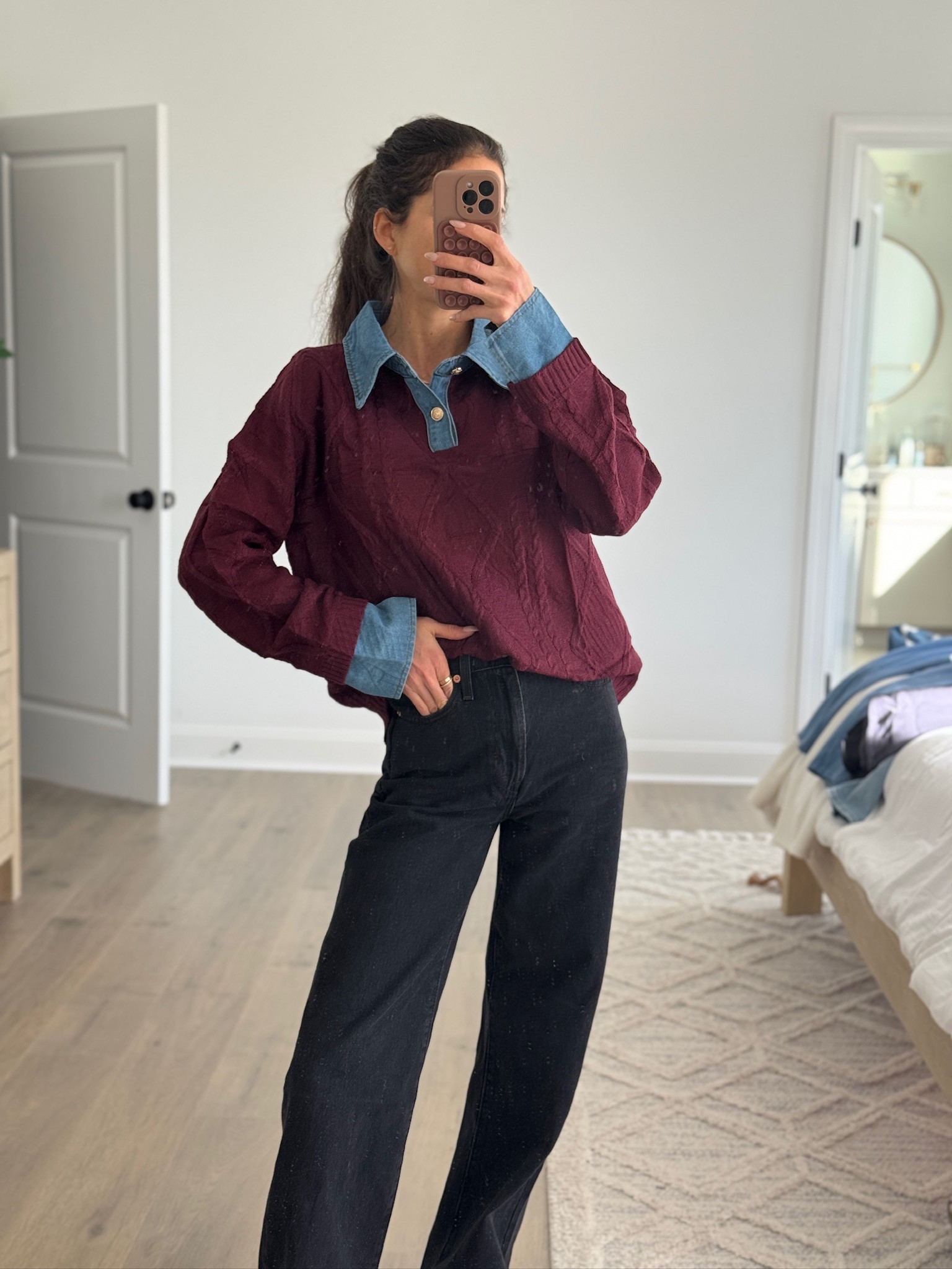 Layered outfit inspiration with a sweater over a denim collared shirt and black wide leg jeans. Casual fall outfit, winter layering ideas, neutral everyday outfit, classic style staples, relaxed fit sweater, wide leg denim, easy mom outfit, simple capsule wardrobe, timeless casual fashion.

#LTKFindsUnder50 #LTKSeasonal #LTKWorkwear