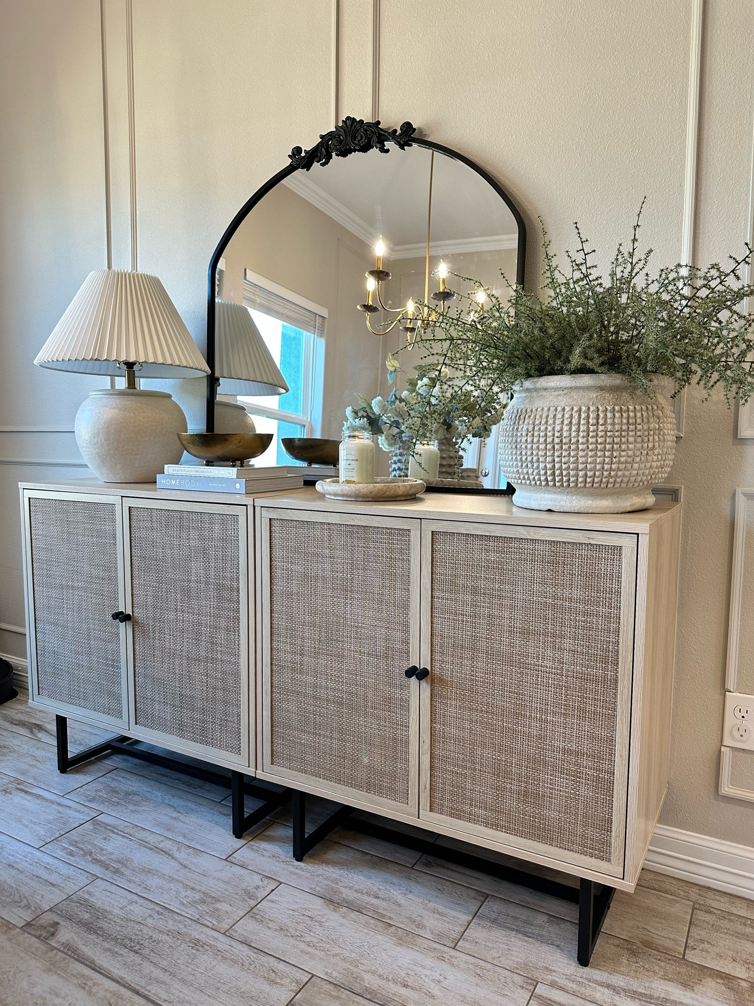 I’m so excited to start to share my dining room refresh. This is how I currently have my sideboard styled. 
Fluted lamp, Anthropologie, tj Maxx finds, antique candle, marble tray, studio McGee, studio McGee home decor, target home decor, target finds, brass bowl, decorate books, book styling, faux greenery 

#LTKFind #LTKhome #LTKstyletip