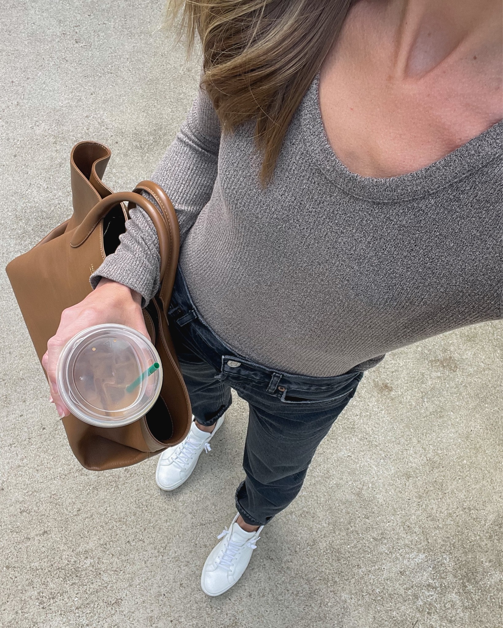 Daily look wearing AGOLDE long sleeve t-shirt (old, similar style linked), AGOLDE jeans (size down one size), Common Projects sneakers (similar, less expensive also linked), KHAITE tote (similar also linked). 

#LTKSeasonal #LTKstyletip #LTKshoecrush