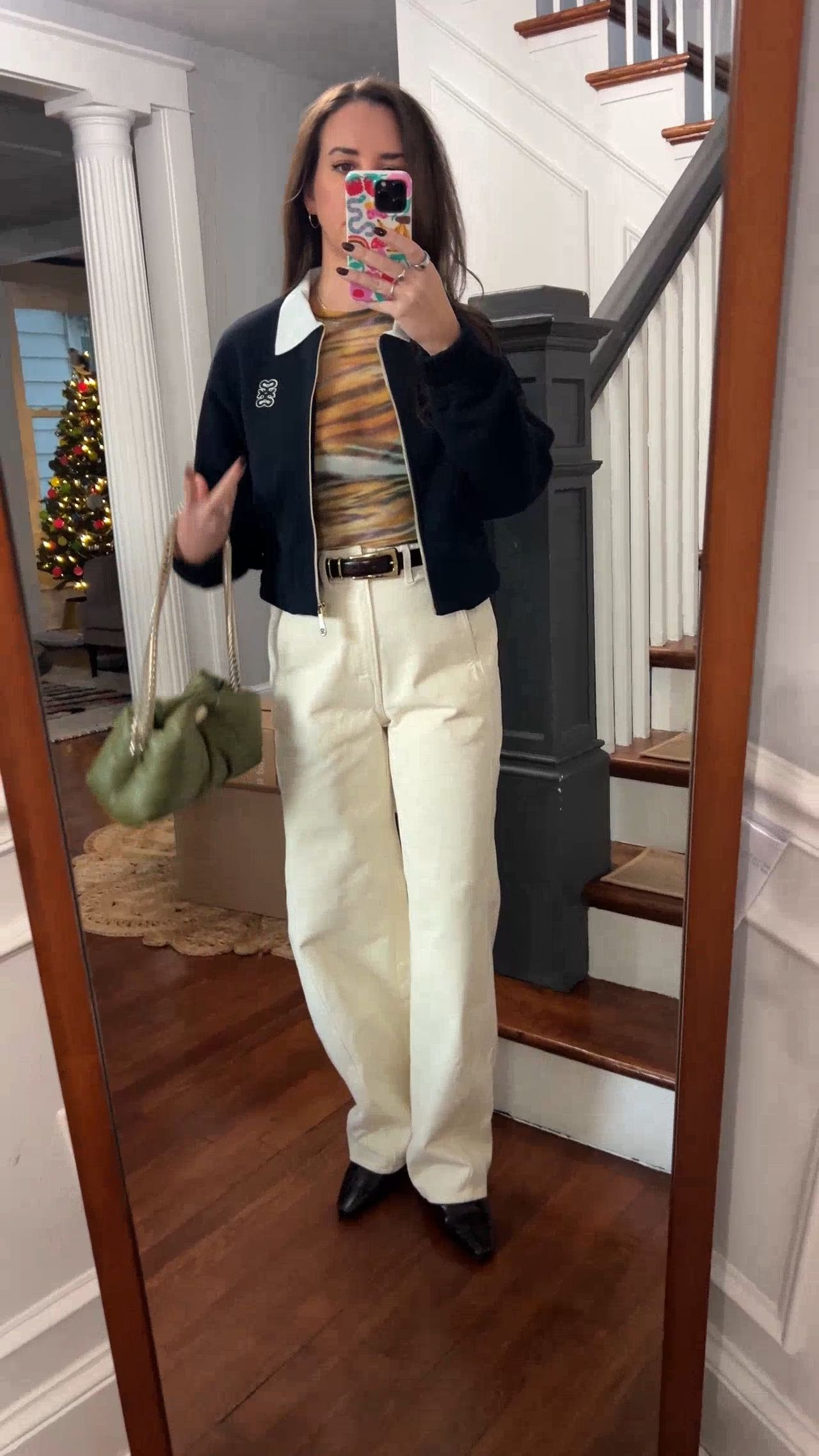 a navy bomber jacket, sheer printed top, ecru jeans, a croc belt. outfit of the night. sandro jacket. rent the runway. madewell belt. apiece apart jeans. afrm top. casual night out. date night. 

 

#LTKootd #LTKFindsUnder100 #LTKSaleAlert