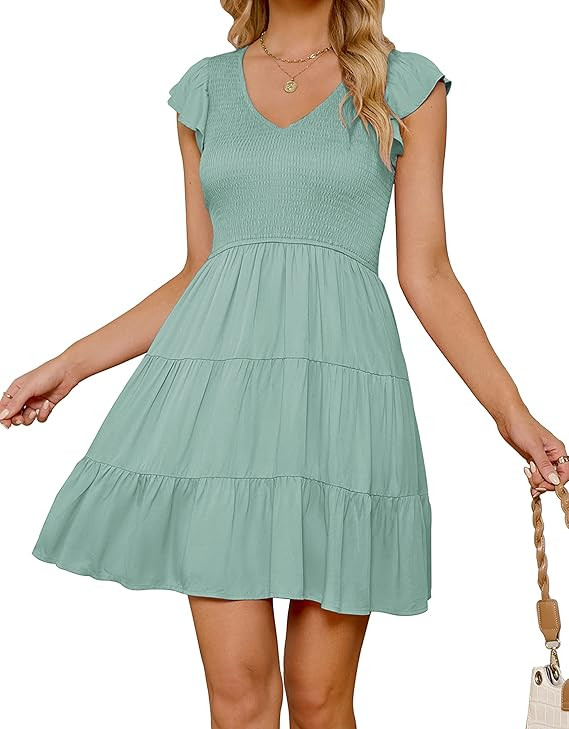 ZESICA Women's 2025 Summer Casual V Neck Flutter Sleeve Bohemian Ruffle Smocked A Line Swing Mini... | Amazon (US)