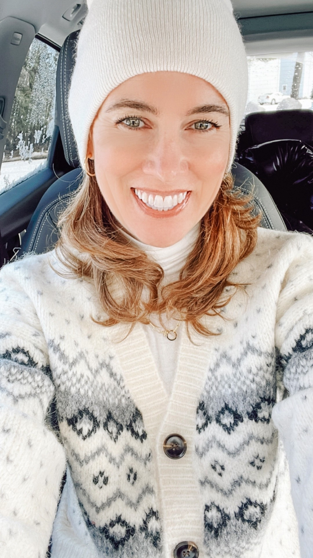 It’s snowing again! And it’s only December ❄️ I love this cozy fair isle cardigan from Lulus. Paired with my Free People turtleneck with my white knit beanie. My OOTD #over40style #mysweaters 

#LTKFindsUnder50 #LTKSeasonal #LTKOver40
