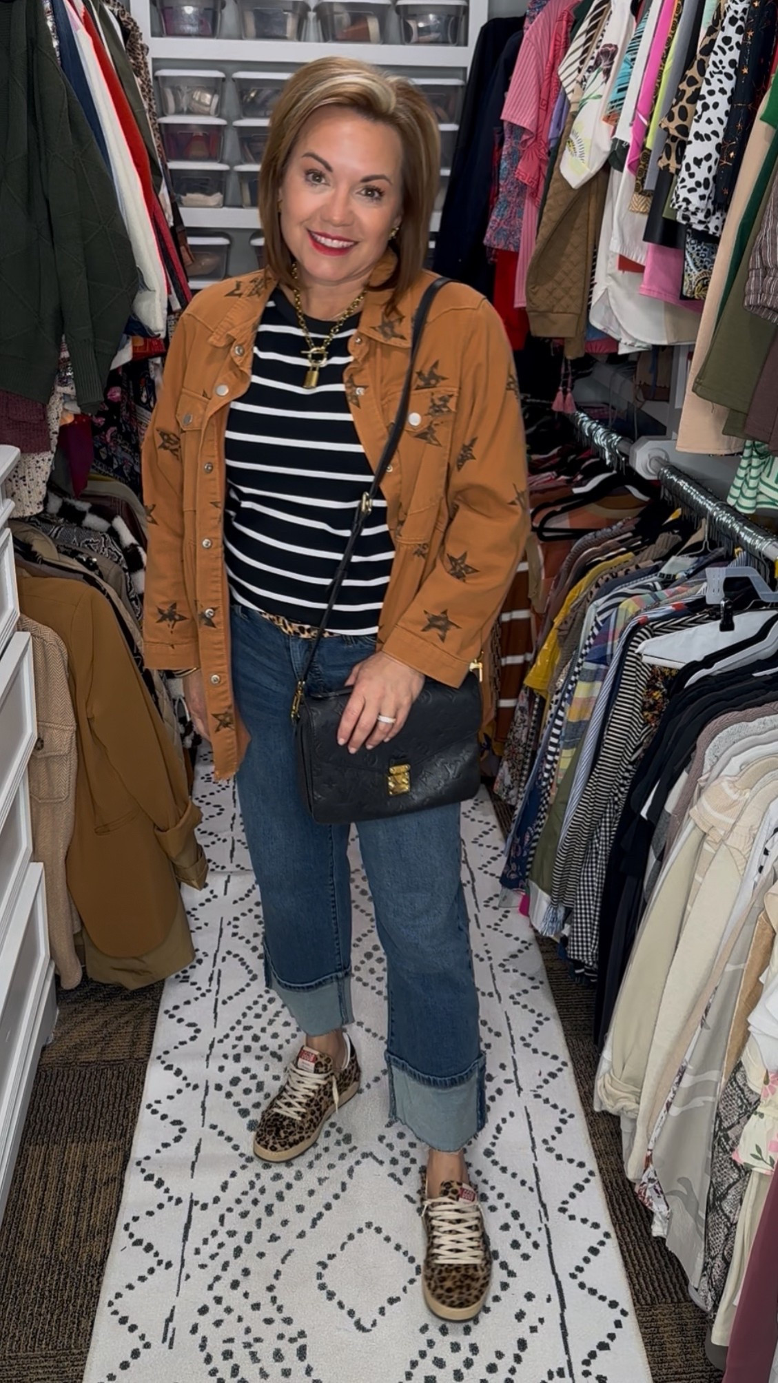 Pattern Mixing Made Easy: Stripes, Stars & a Pop of Leopard

A little pattern play for fall! 🍂 I love adding an extra layer — it’s the easiest way to introduce texture and print without overdoing it. This star-print shacket works perfectly over a classic black-and-white striped top, and I finished it off with a hint of leopard for a fun twist.

Styling tip: Keep one color consistent across patterns — here it’s the black tones — so everything feels cohesive.

Shop my look:
🖤 Star print shacket (Amazon find!)
🤍 Striped top
💛 Leopard sneakers
👖 Wide cuff jeans
👜 Black crossbody

#FallOutfitInspo #AmazonFashionFinds #PatternMixingStyle #CasualChic #StyleOver50 #FallLayering #StripesAndStars #OOTDInspo #LTKFallStyle #LayeredLook #LeopardSneakers #EverydayStyle

⸻

fall outfit inspiration, layering outfit ideas, star print shacket, striped shirt outfit, leopard sneakers outfit, pattern mixing outfit ideas, casual fall outfit, jeans and sneakers outfit, everyday fall style, amazon fashion finds, affordable fall outfit, chic casual style, classic stripe top, over 50 style inspiration, fall outfit layering, street style fall look, trendy over 50 outfit, neutral layering outfit, casual weekend outfit, comfy stylish look, patterned shacket, stripe and leopard outfit, amazon shacket, cute fall fashion finds, easy layering ideas, transitional outfit fall, fall fashion outfit ideas, modern classic outfit, timeless casual outfit, amazon outfit inspiration, fall capsule wardrobe ideas

#LTKFindsUnder50 #LTKStyleTip #LTKSeasonal