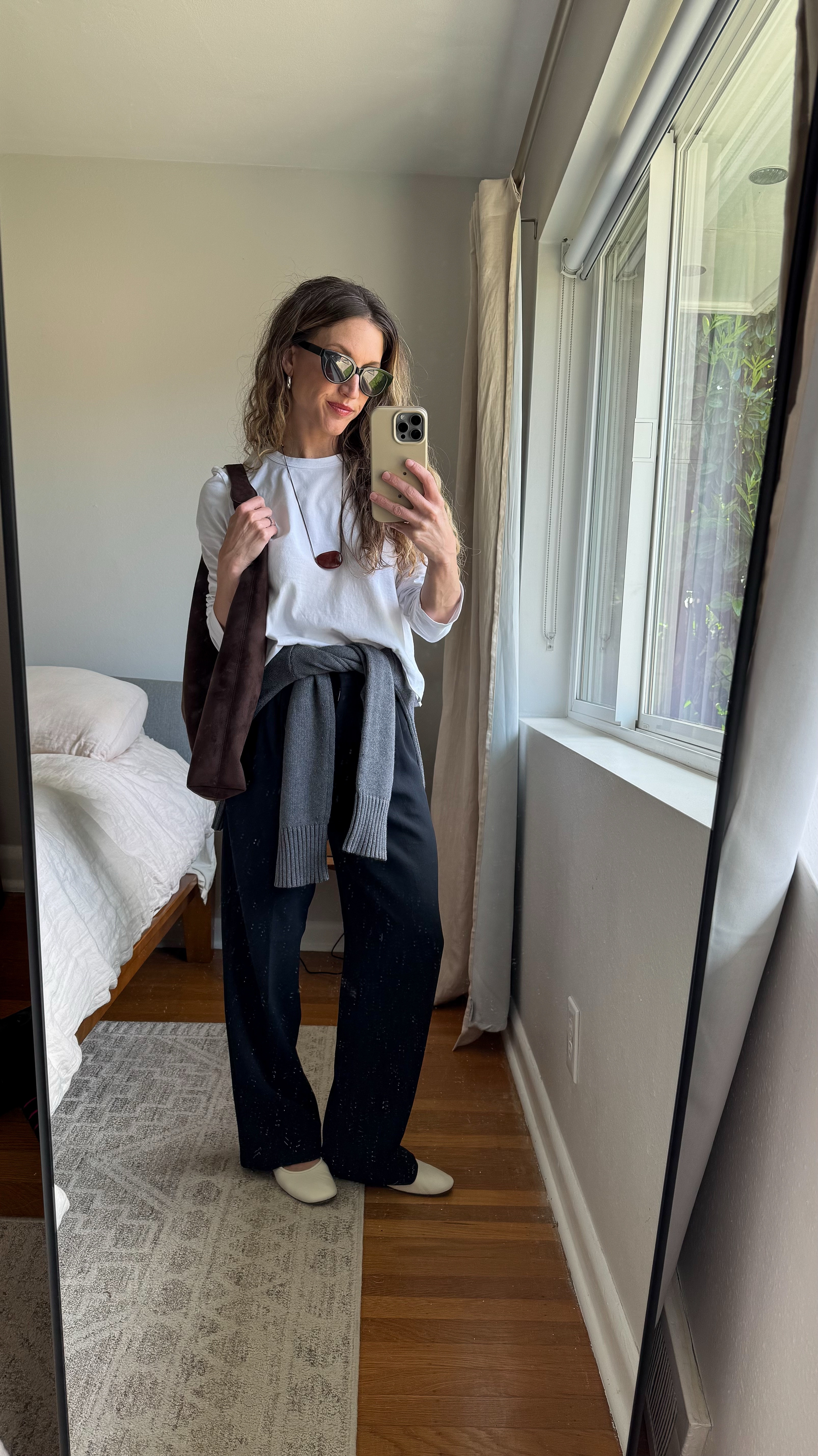 What I Wore: 5.2

Leset tee, XS, TTS. Aritzia trousers, I sized up to the 2 and got the short length. Everlane sweater at the waist, XS, TTS. Everlane flats, run a tad small, consider sizing up a half size. Gap bag. Quince sunglasses. Heaven Mayhem necklace. Chunky Silver Hoops from Sela Designs, ASHLEYROHR10 for 10% off  

#LTKPetite #LTKOver40 #LTKSeasonal