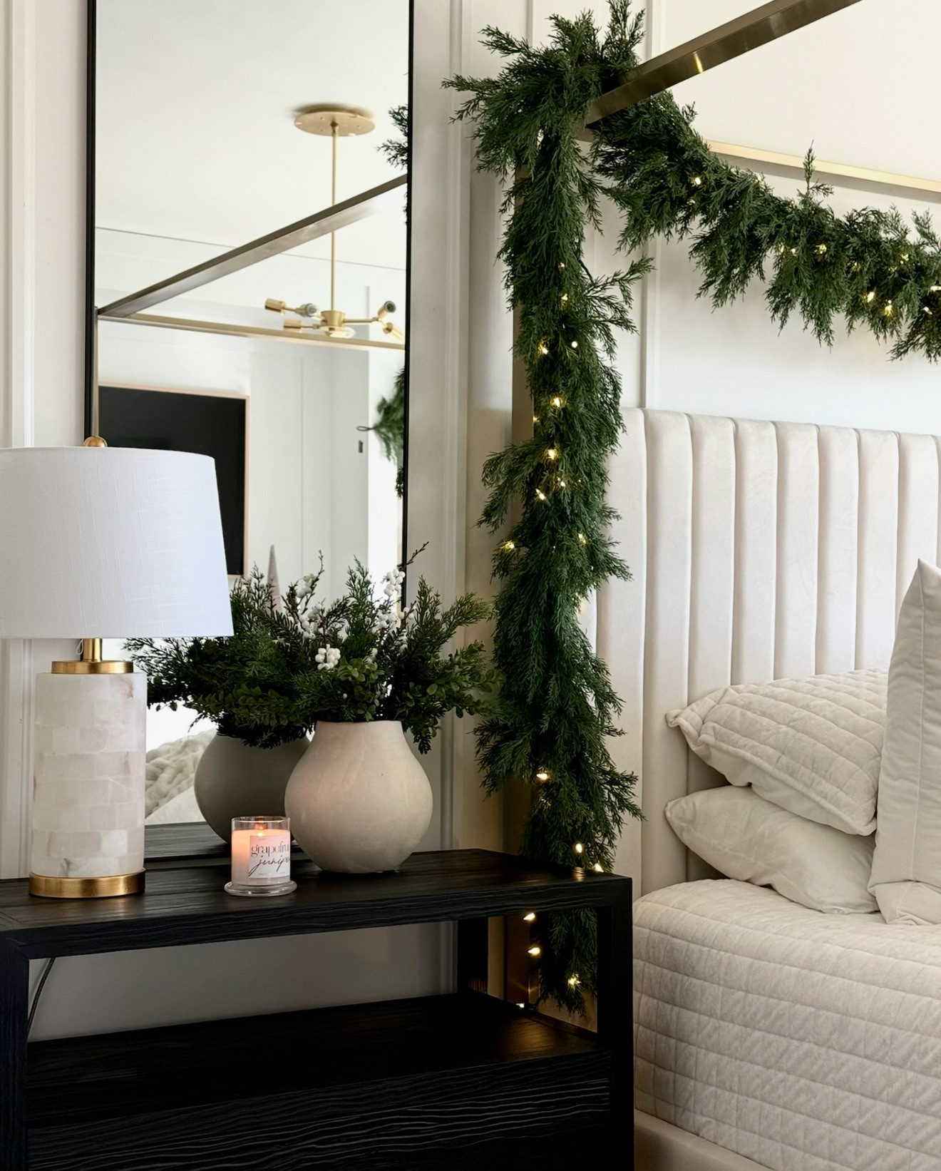✨LUXE HOLIDAY BEDROOM WITH COZY GREEN ACCENTS✨ This bedroom feels like a winter retreat — lush garland draped over the bed, warm candlelight, and layers of soft textures. The mix of greenery, creamy neutrals, and subtle gold accents brings that effortless, elevated holiday charm to every corner. #TheHillaryStyle #LuxuryHomeDecor #AmazonFinds #HolidayDecor #BedroomInspo #NeutralChristmas #ModernOrganic #CozyChic #DesignerLookForLess #WinterStyling #HomeAesthetic #ElegantInteriors #HolidayHome #SeasonalStyling #TimelessDesign 

 #LTKHoliday #LTKSeasonal #LTKStyleTip
